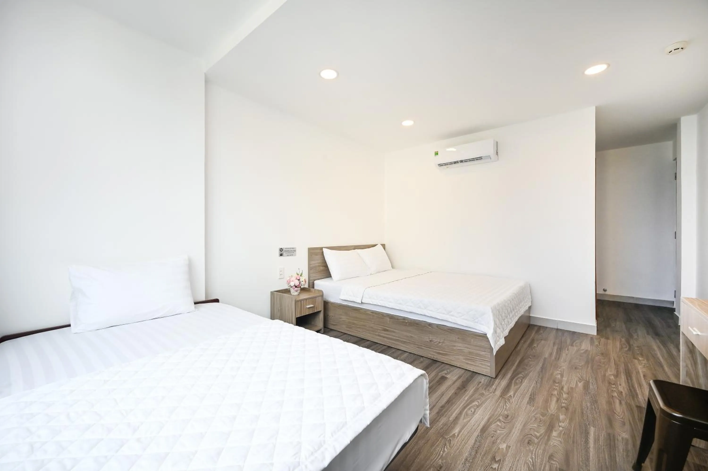 Bed in YoKo Airport Saigon Hotel