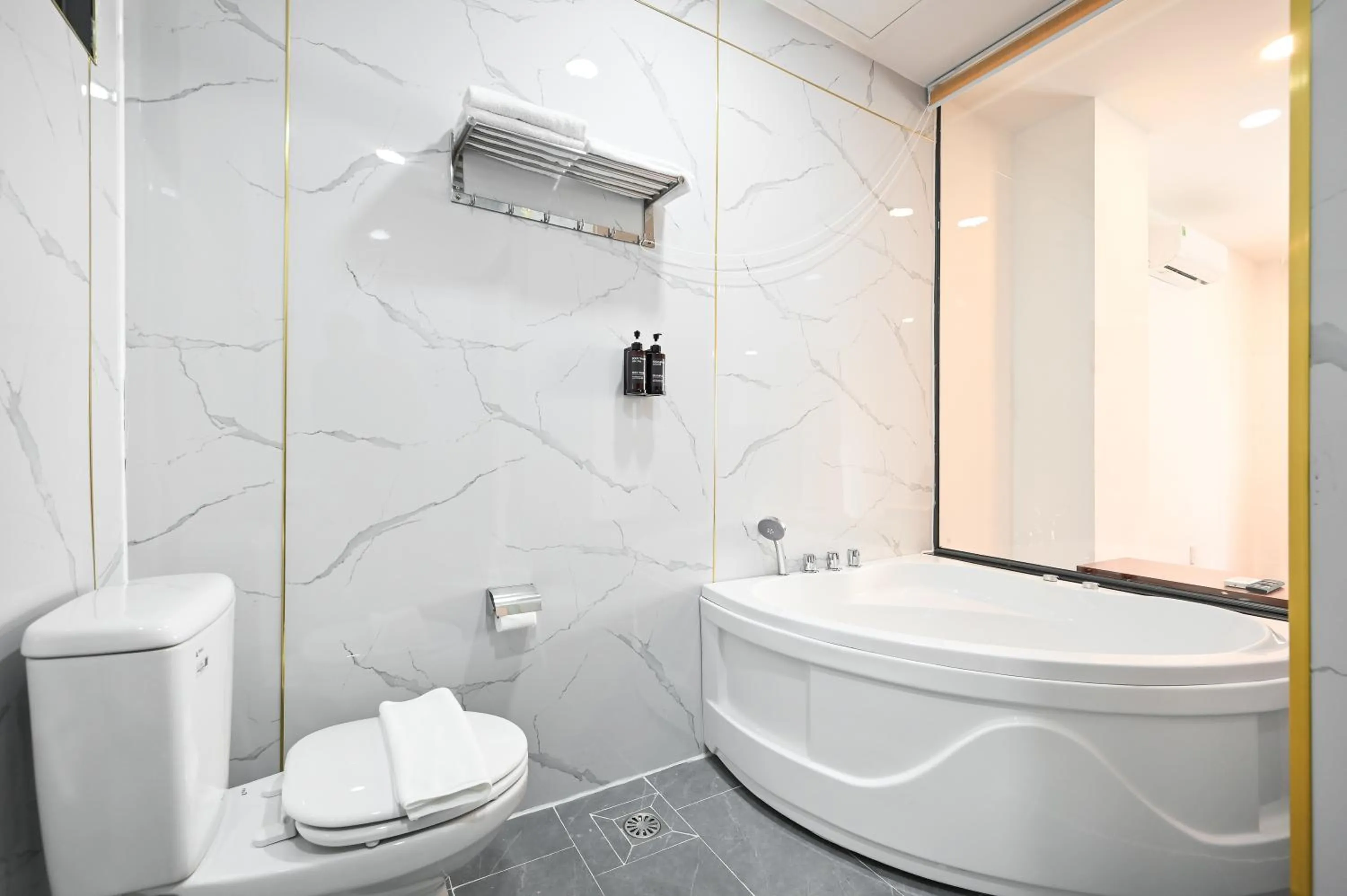 Shower in YoKo Airport Saigon Hotel