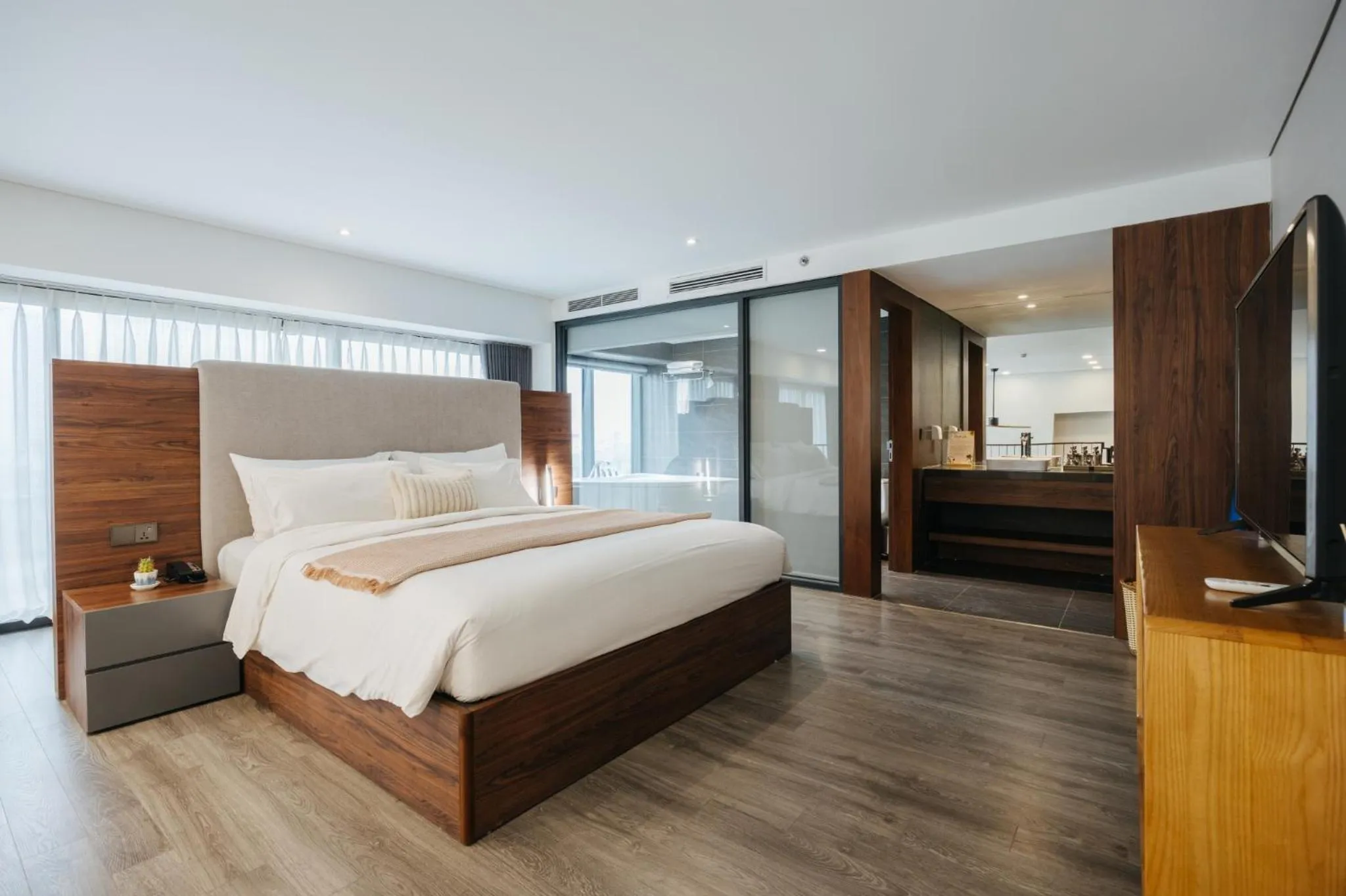 Bed in PentStudio Duplex Apartment