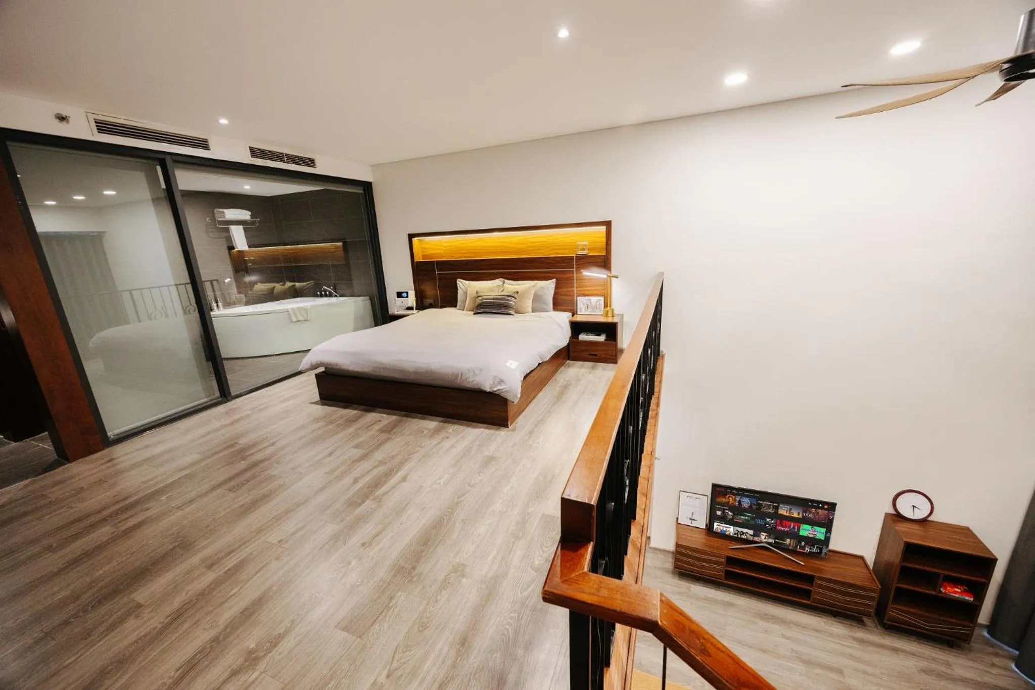 Bed in PentStudio Duplex Apartment