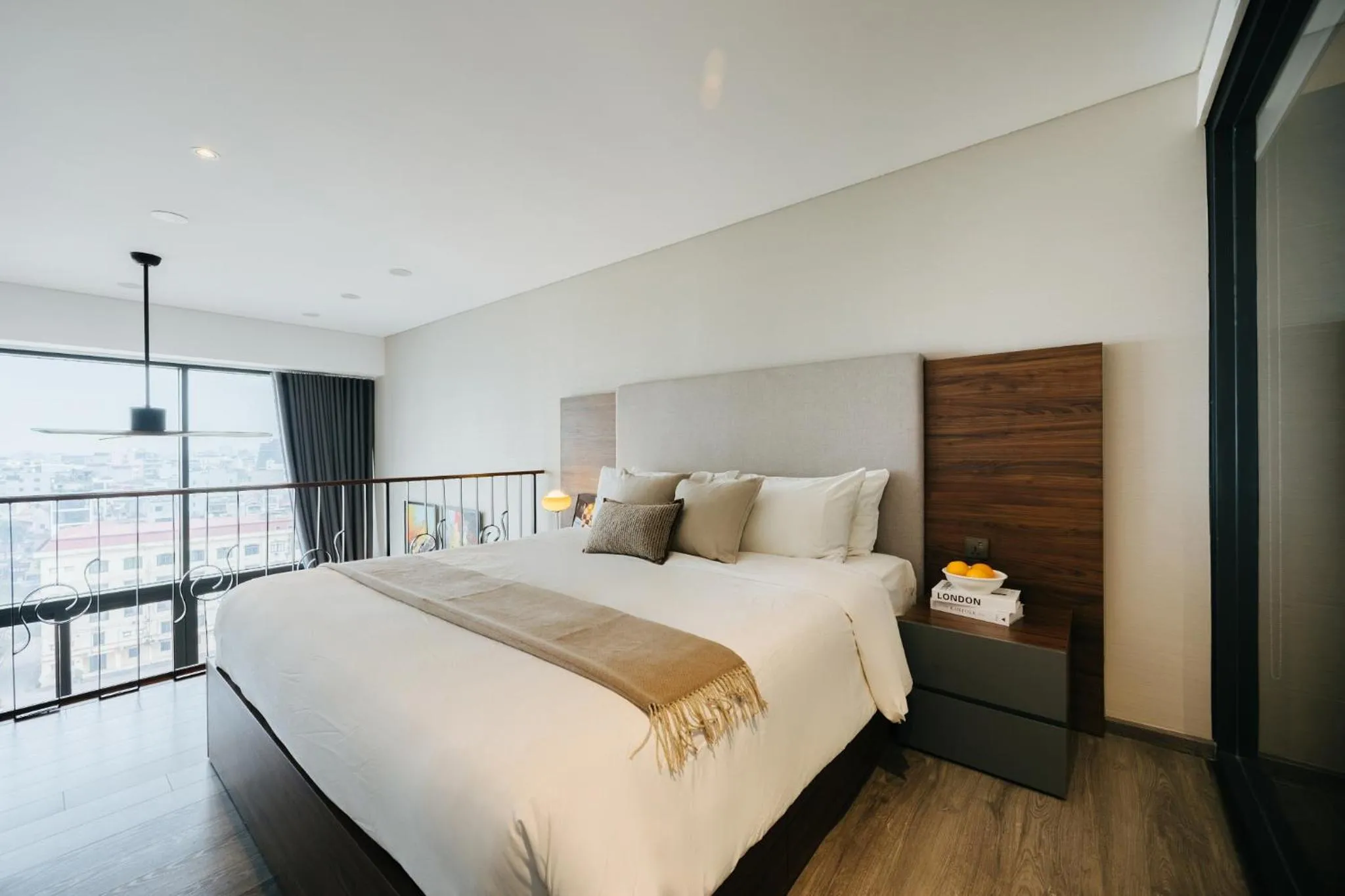 Bed in PentStudio Duplex Apartment