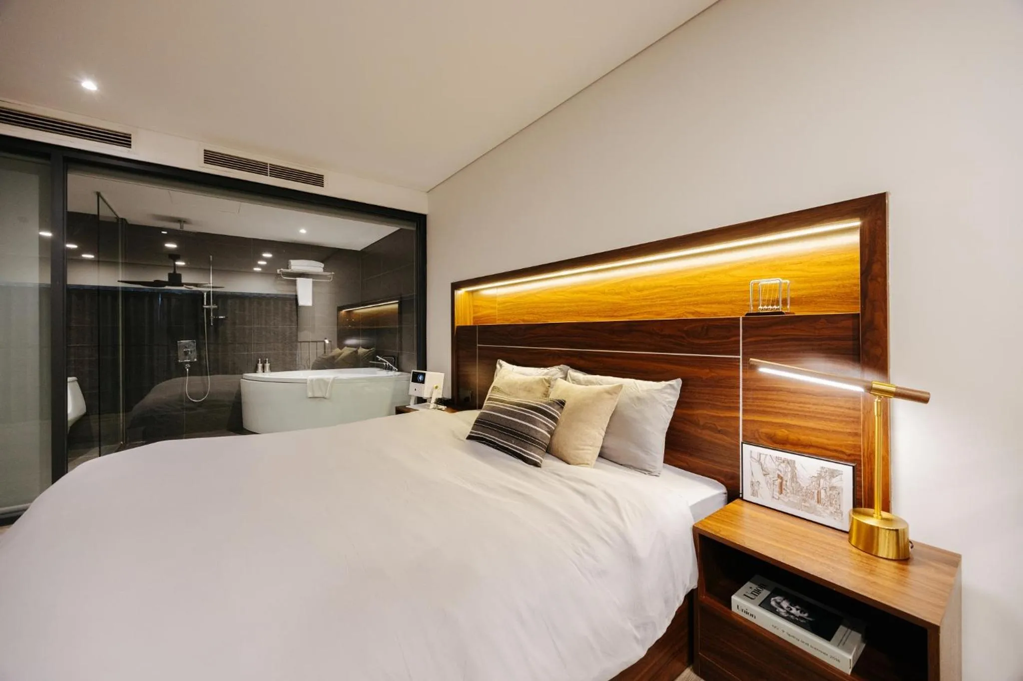 Bed in PentStudio Duplex Apartment
