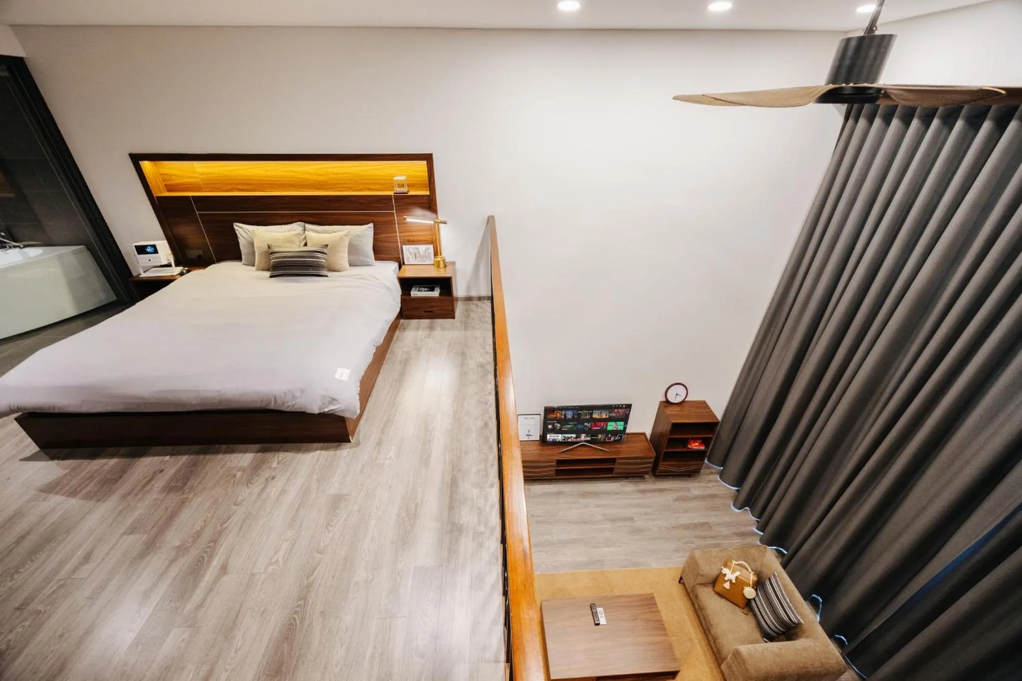 Bed in PentStudio Duplex Apartment