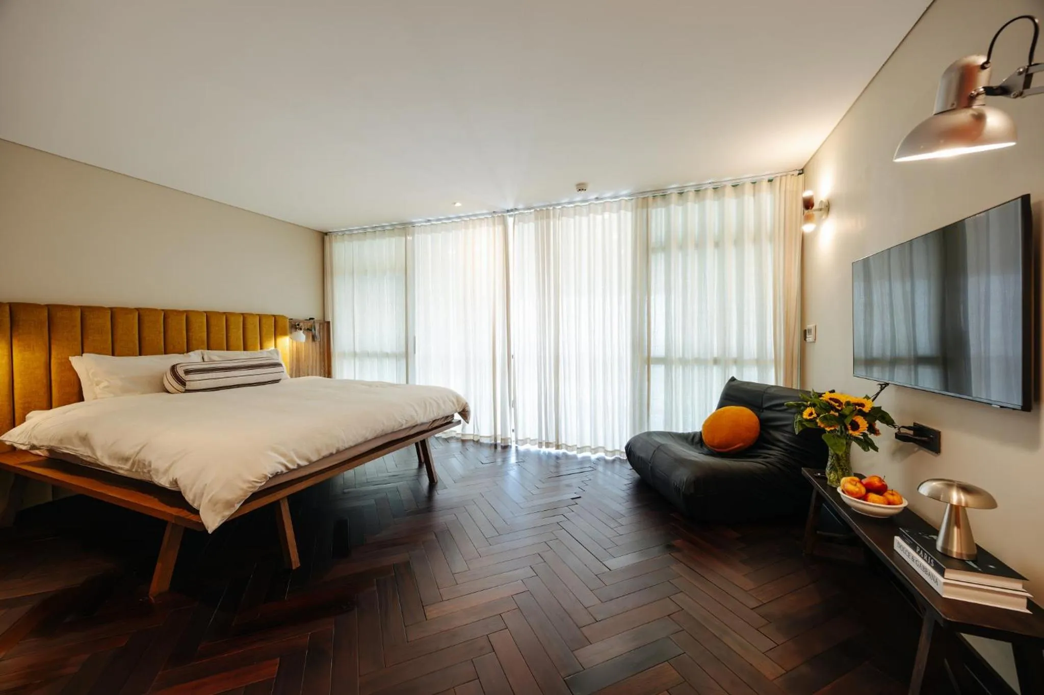 Bed in PentStudio Duplex Apartment