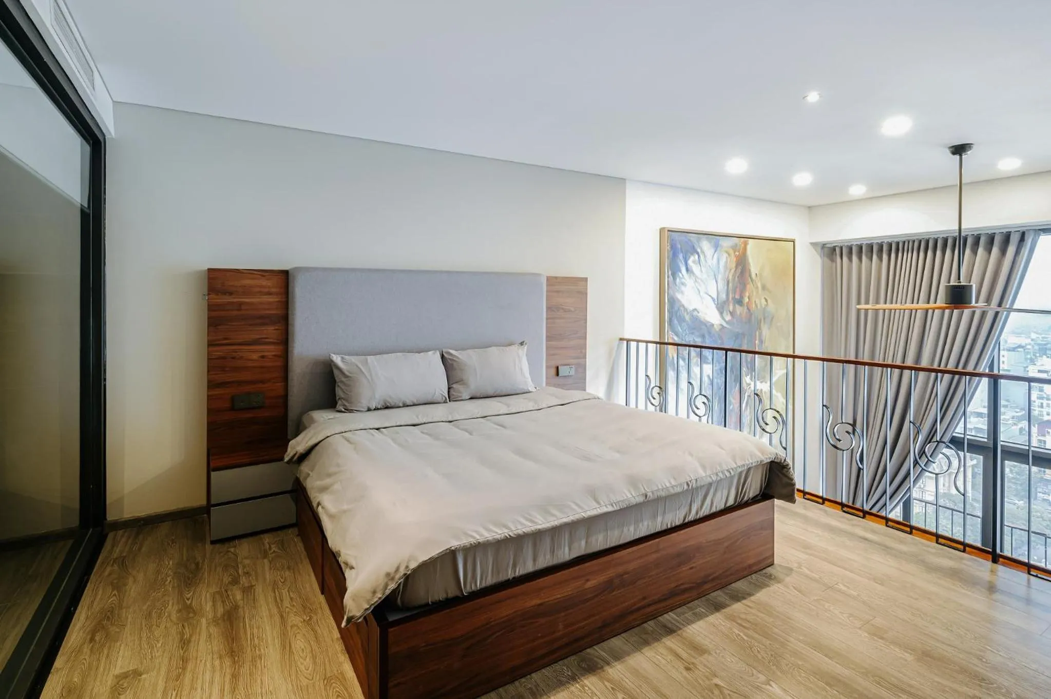 Bed in PentStudio Duplex Apartment