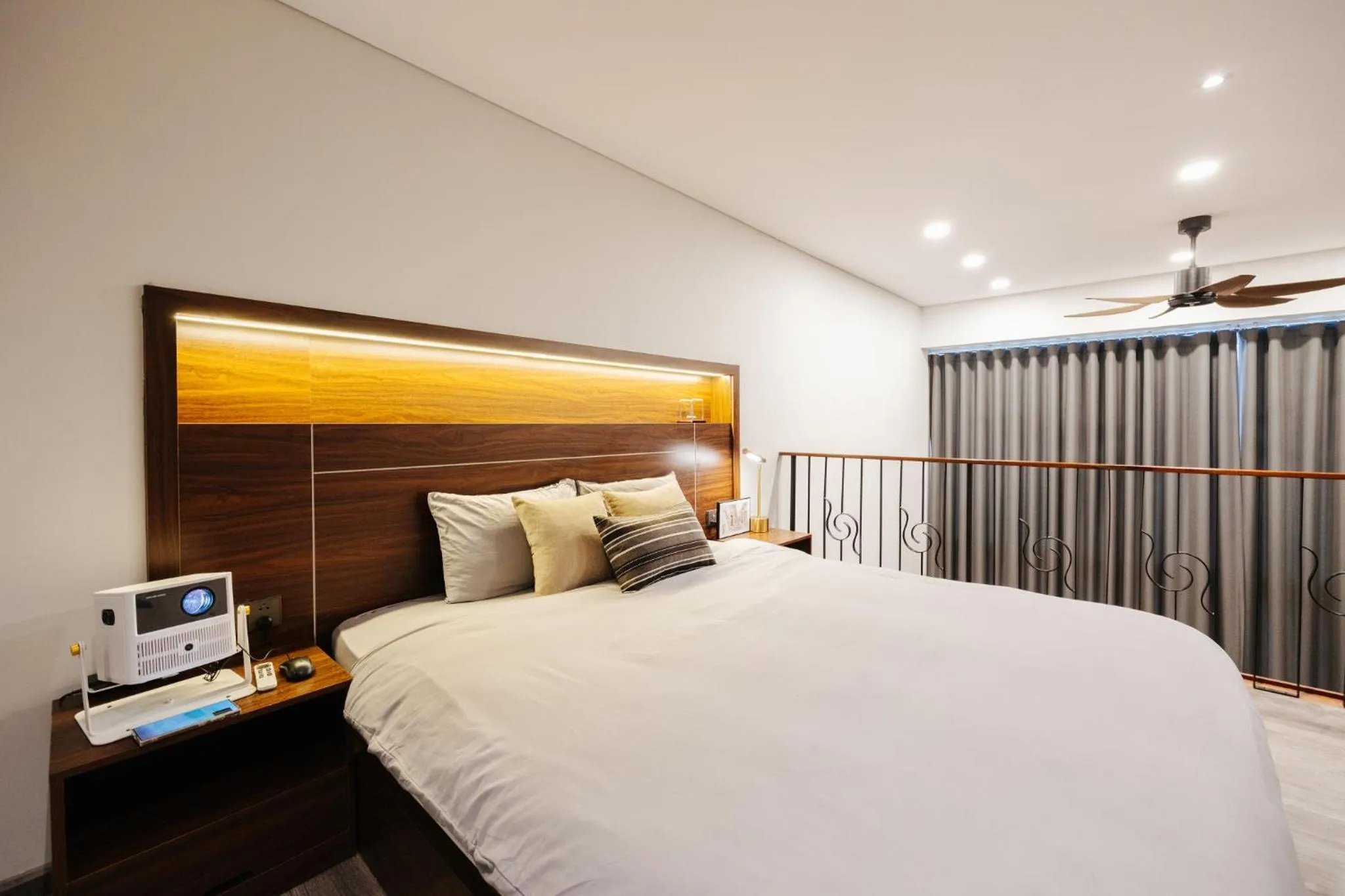 Bed in PentStudio Duplex Apartment