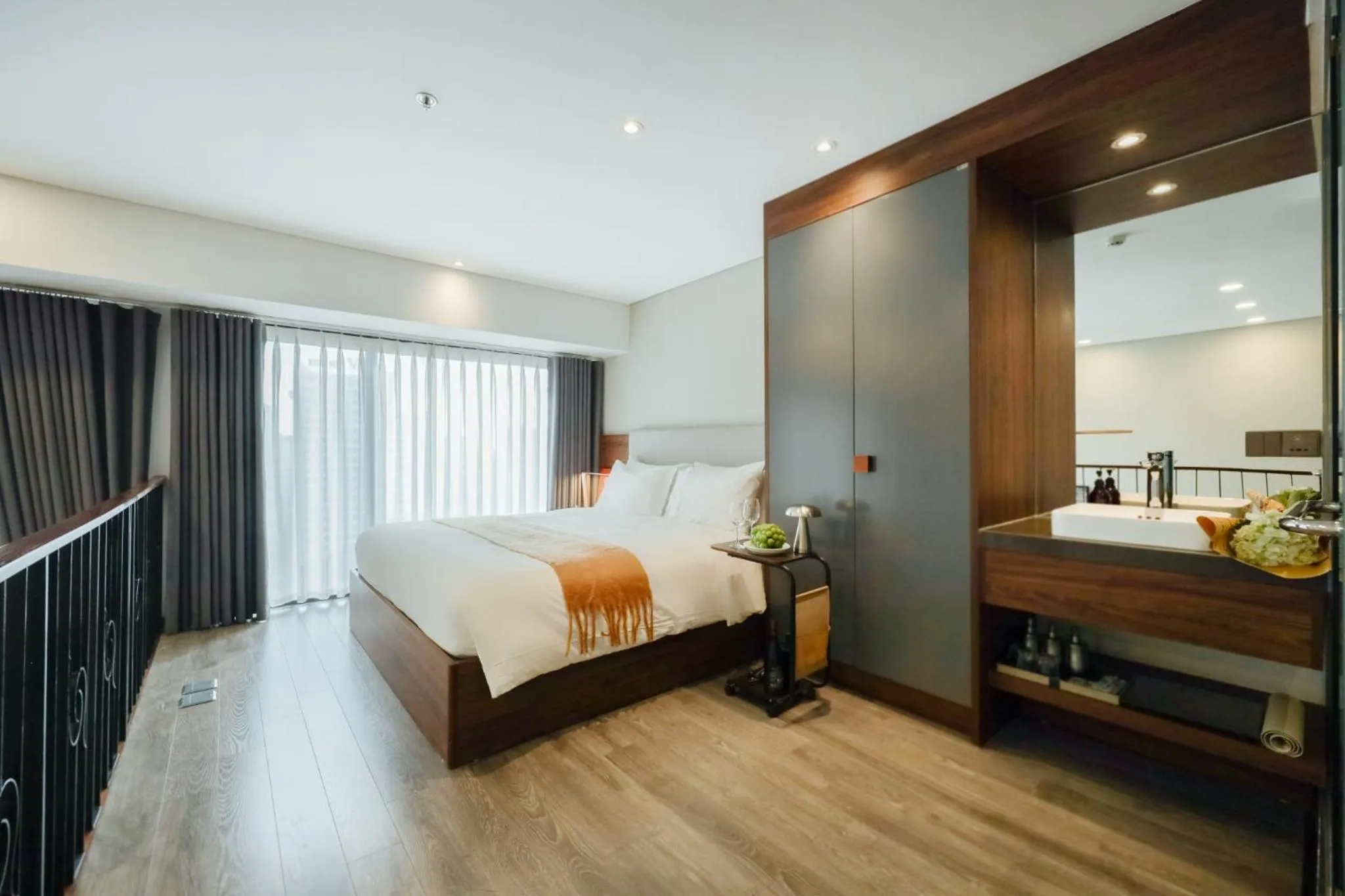 Bed in PentStudio Duplex Apartment