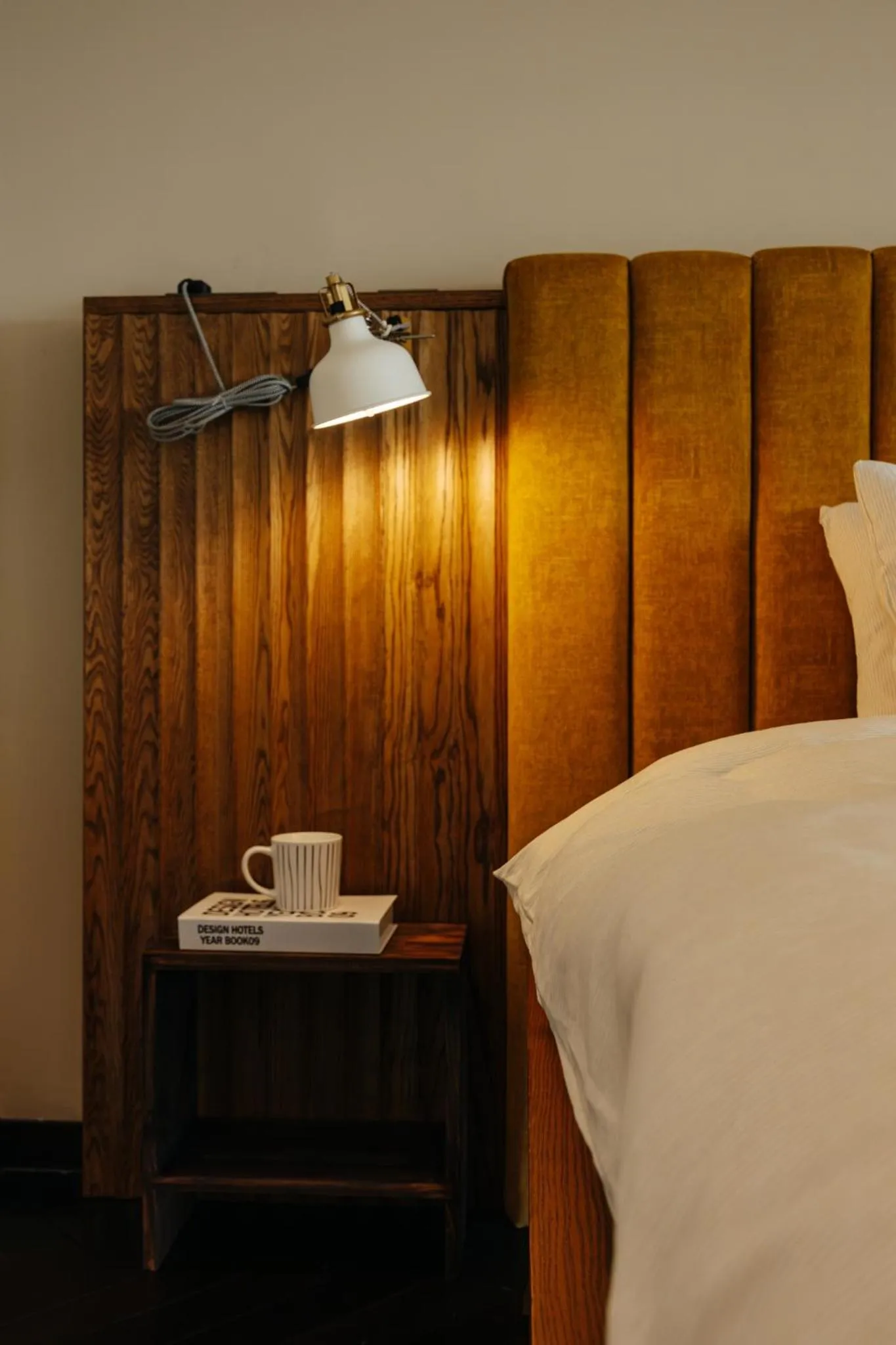Bed in PentStudio Duplex Apartment