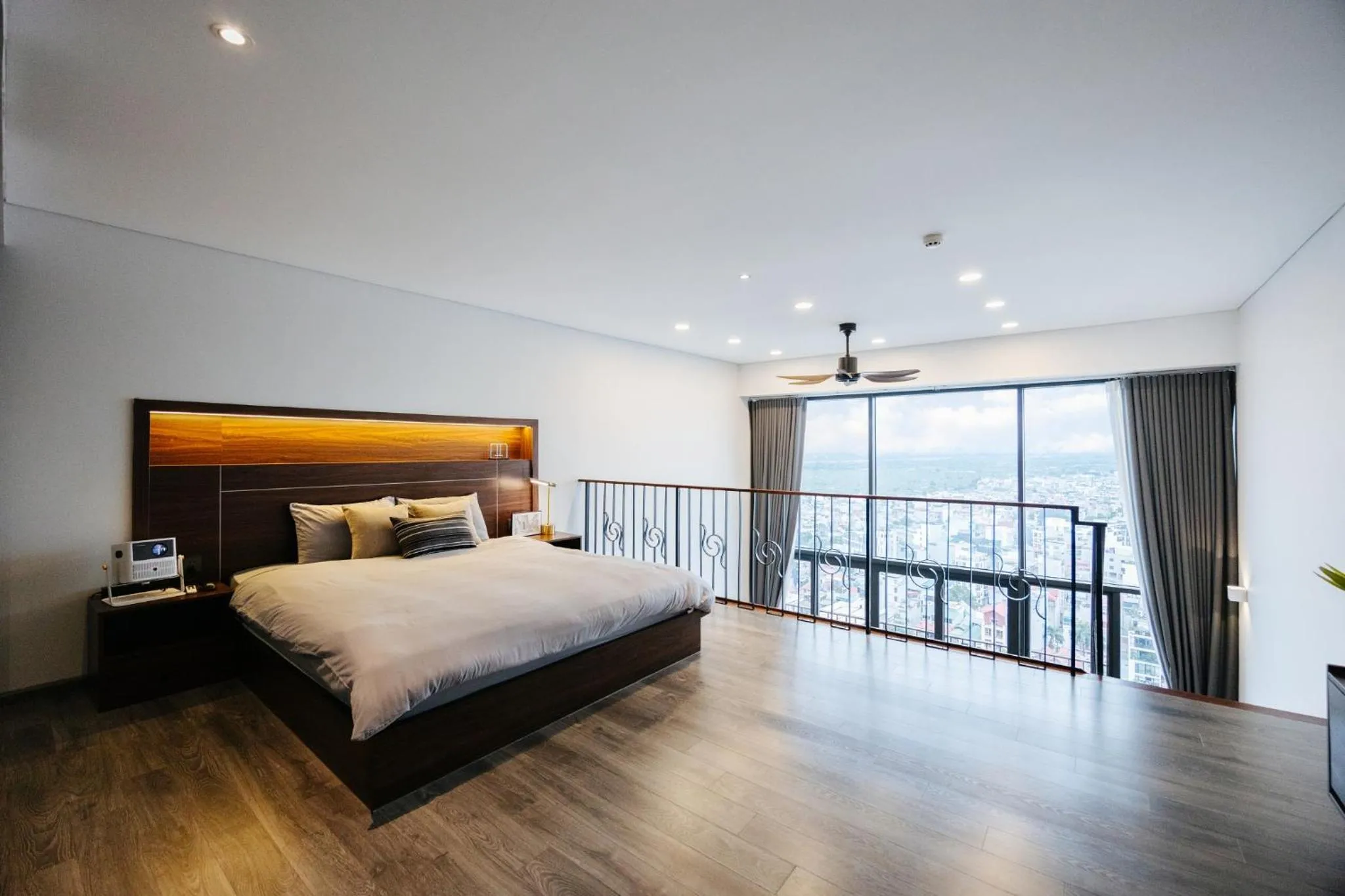 Bed in PentStudio Duplex Apartment