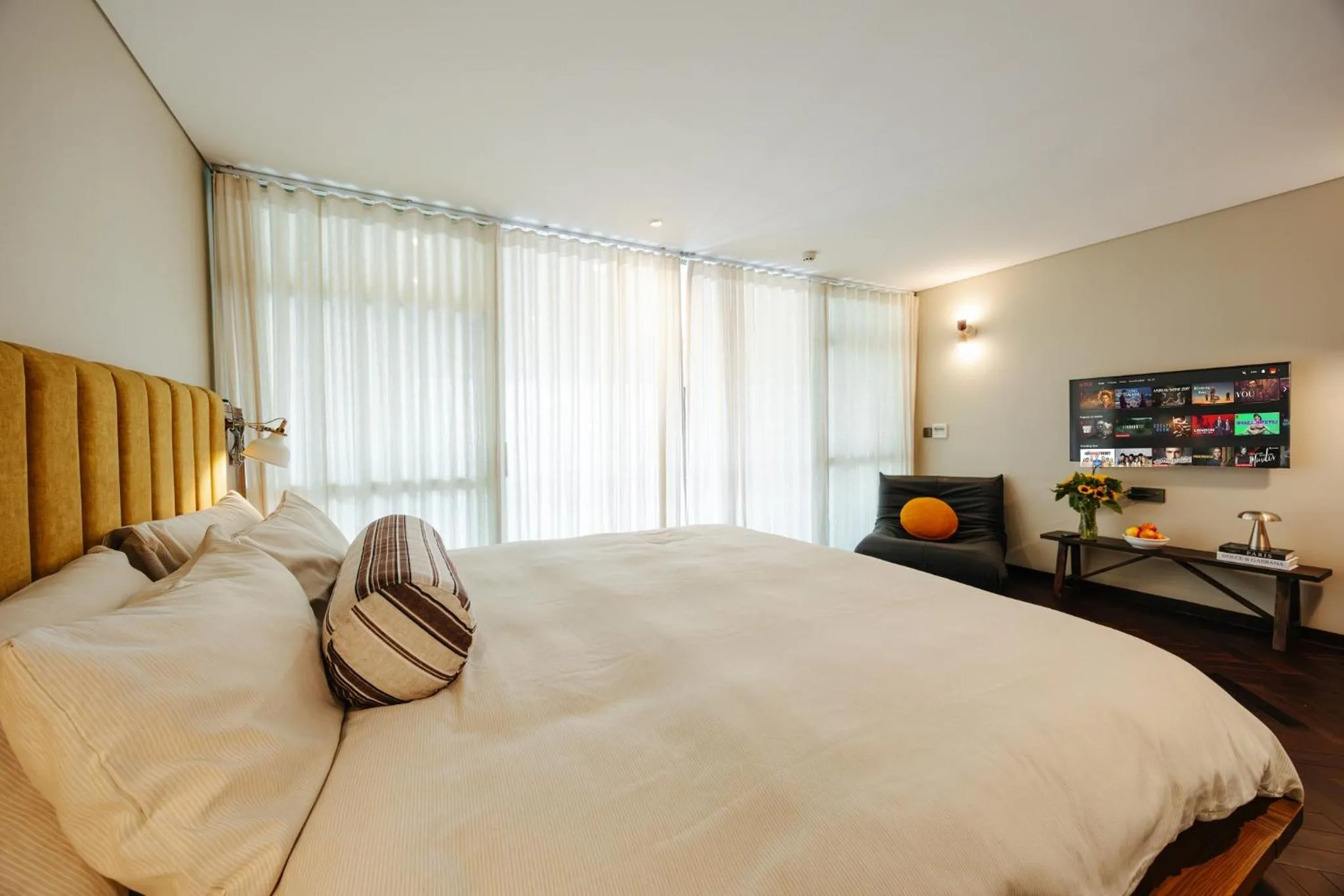 Bed in PentStudio Duplex Apartment