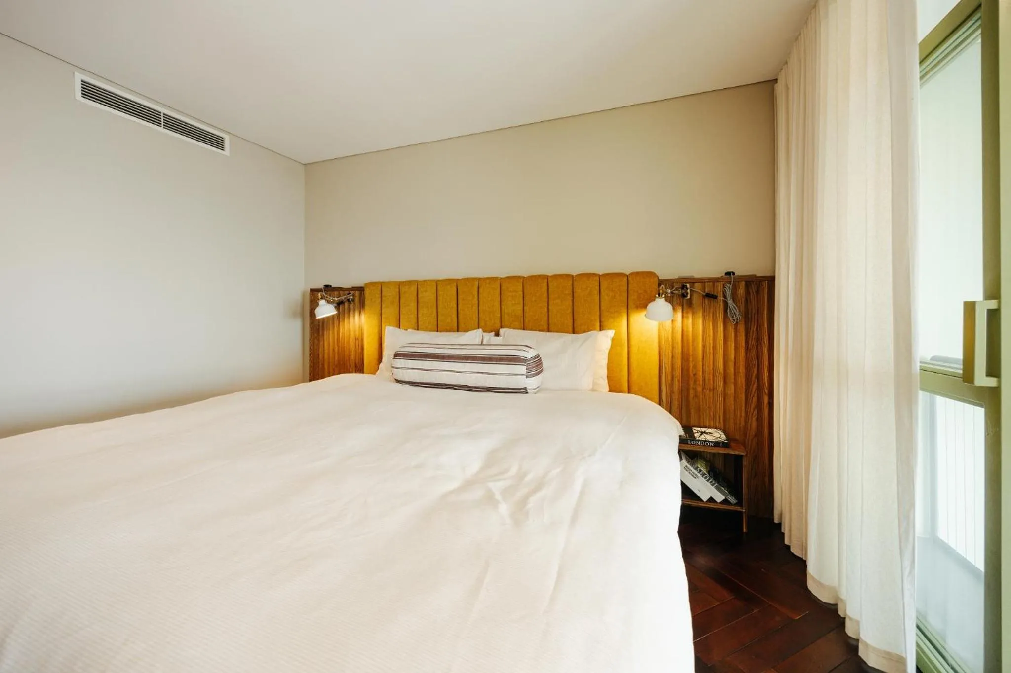 Bed in PentStudio Duplex Apartment