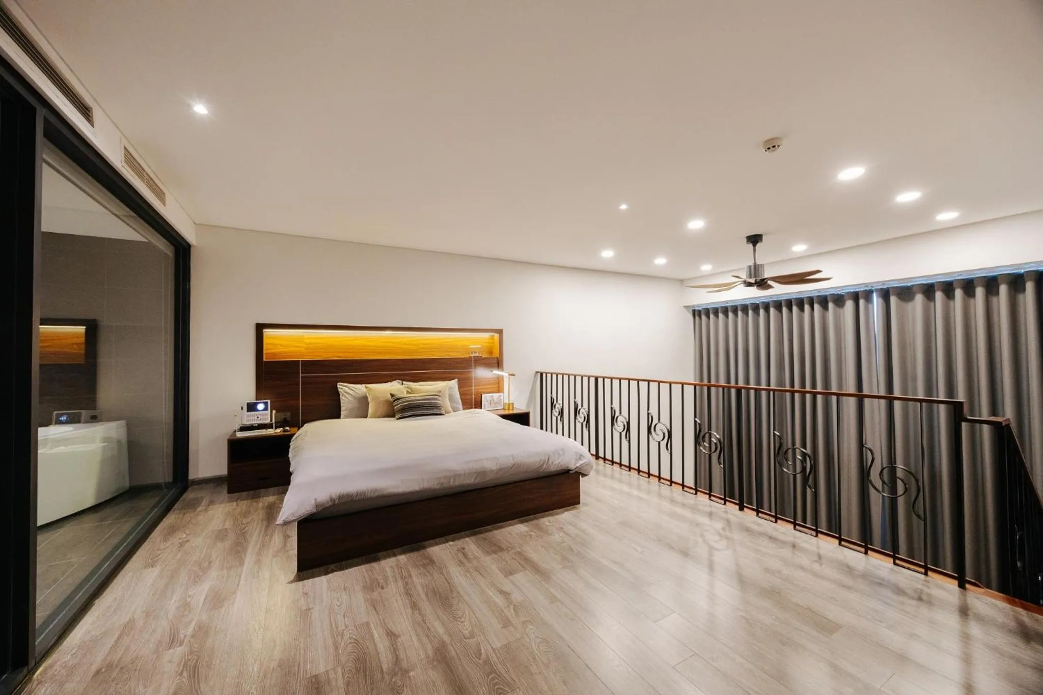 Bed in PentStudio Duplex Apartment