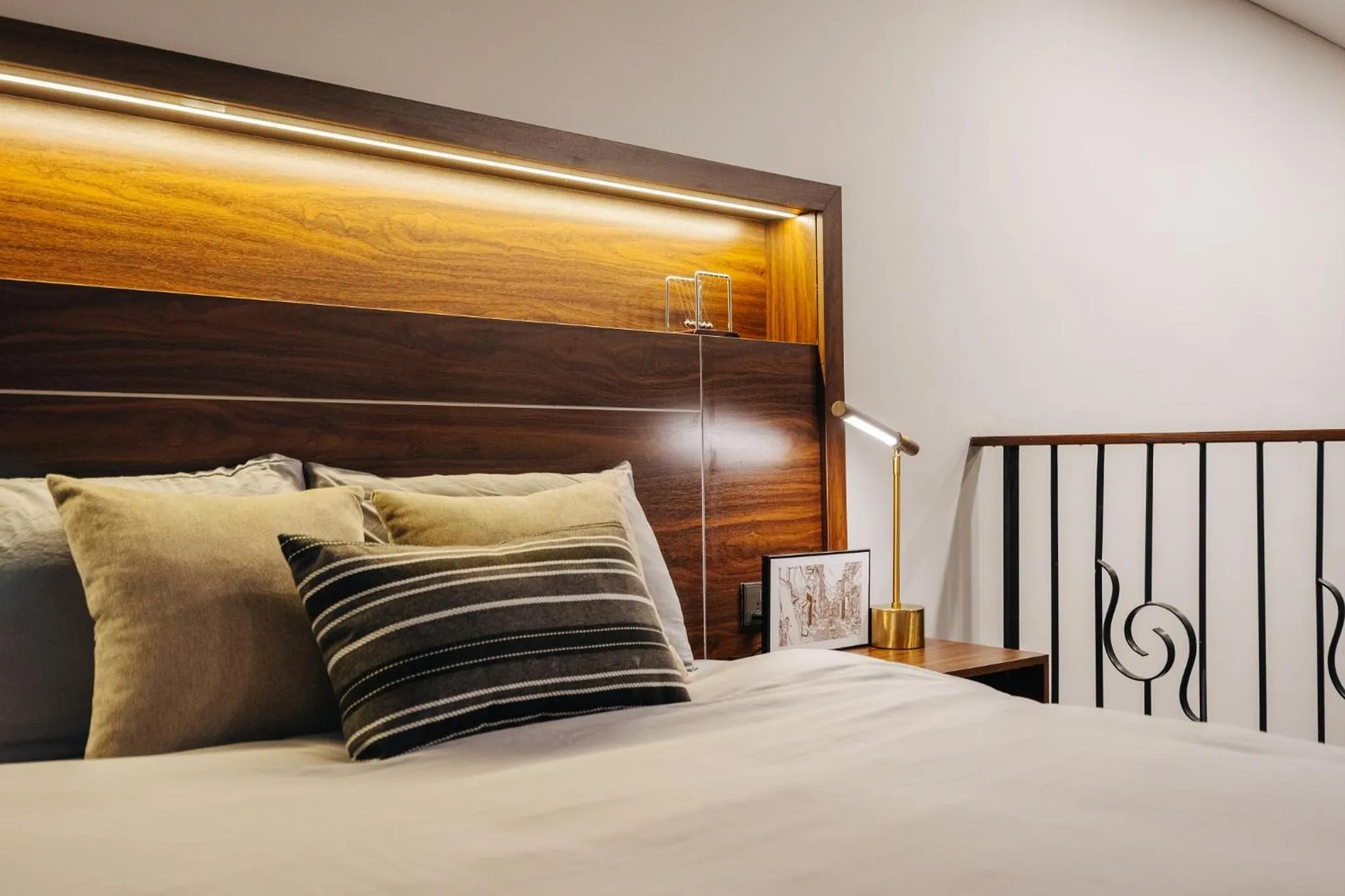 Bed in PentStudio Duplex Apartment