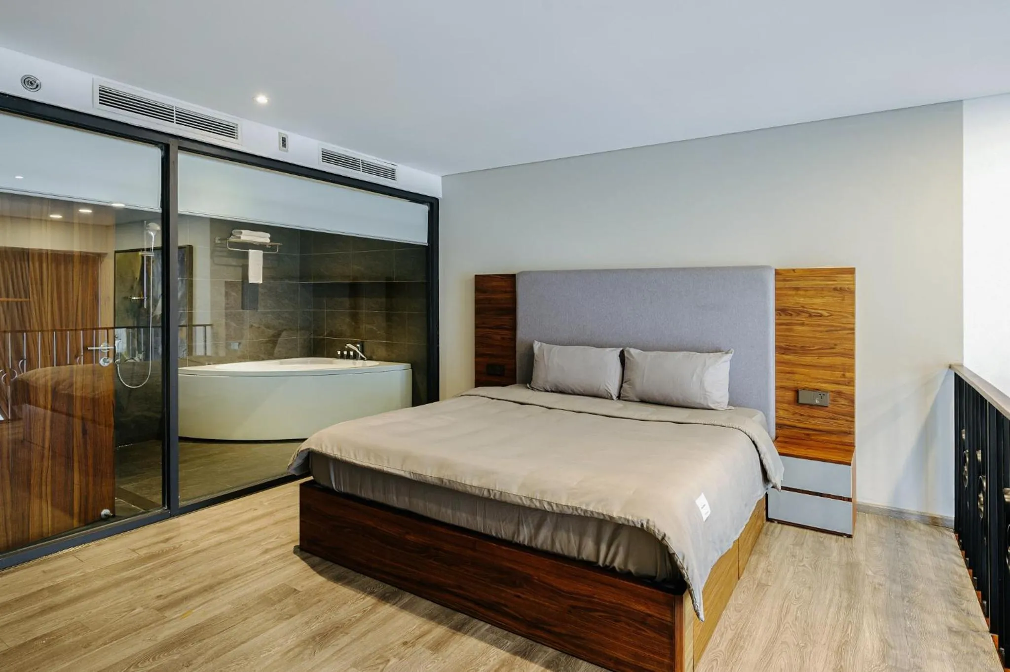 Bed in PentStudio Duplex Apartment