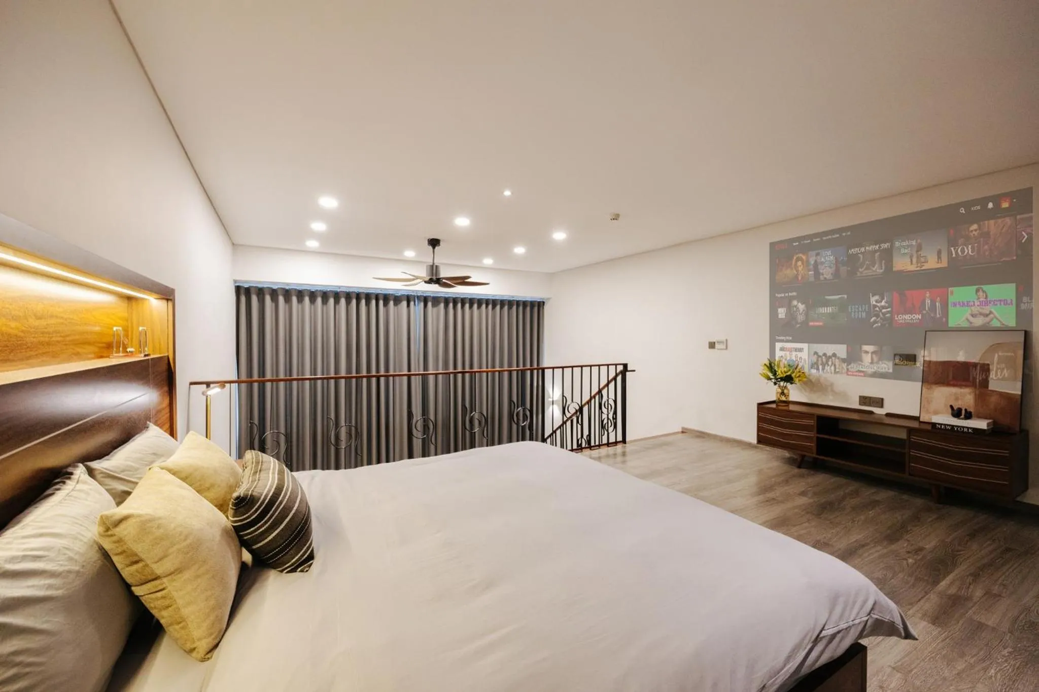 Bed in PentStudio Duplex Apartment