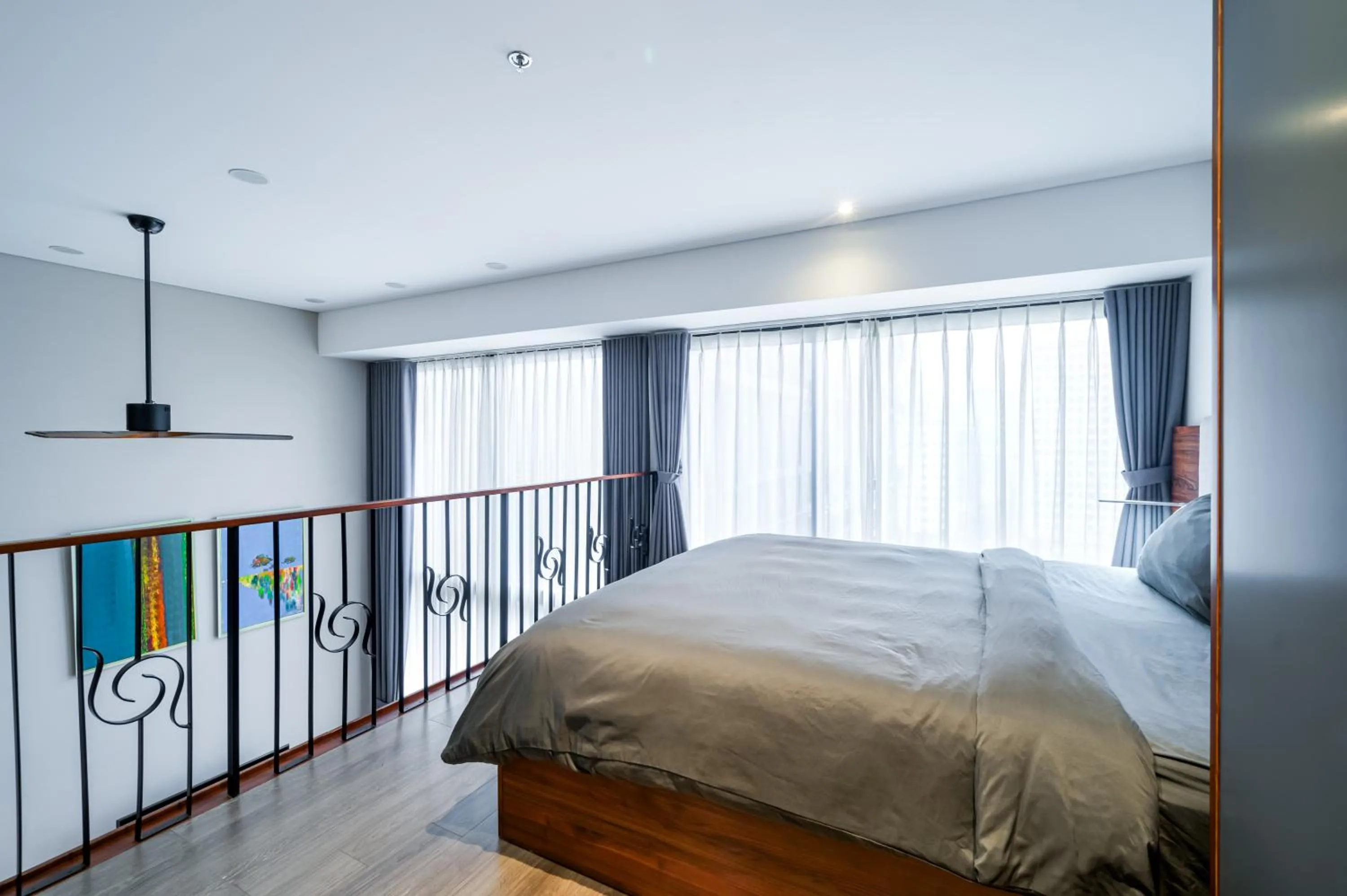 Bed in PentStudio Duplex Apartment