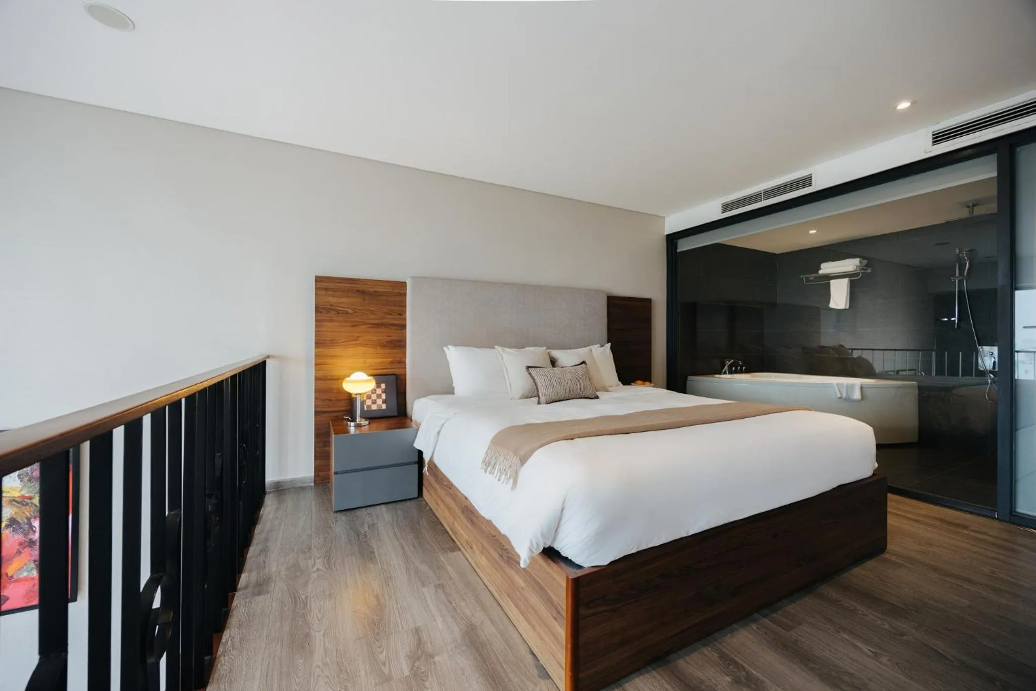 Bed in PentStudio Duplex Apartment