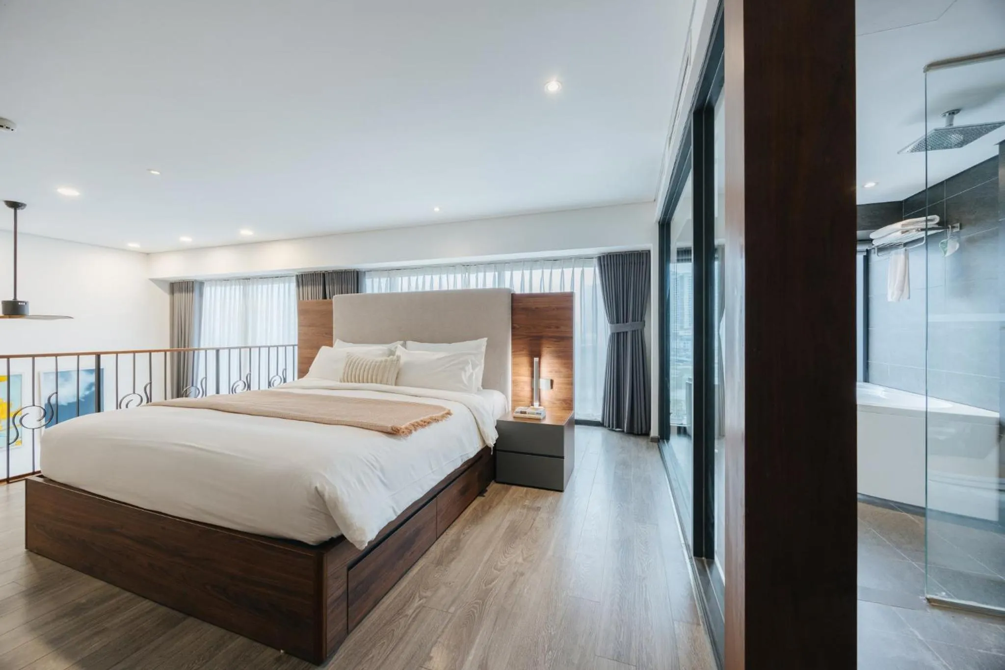 Bed in PentStudio Duplex Apartment