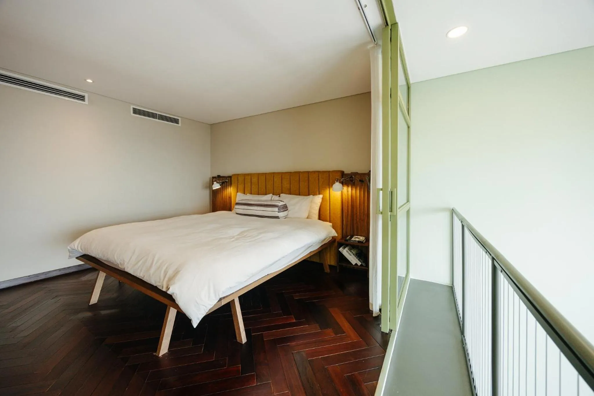Bed in PentStudio Duplex Apartment