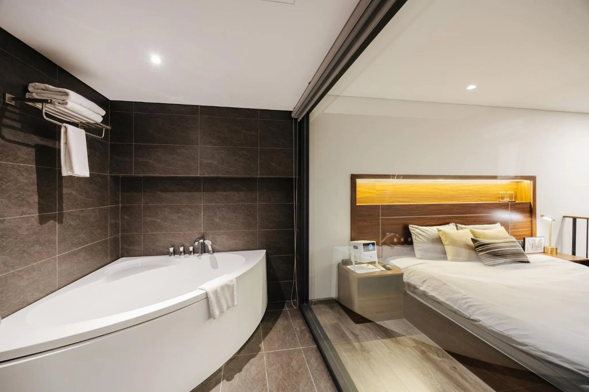 Bed in PentStudio Duplex Apartment