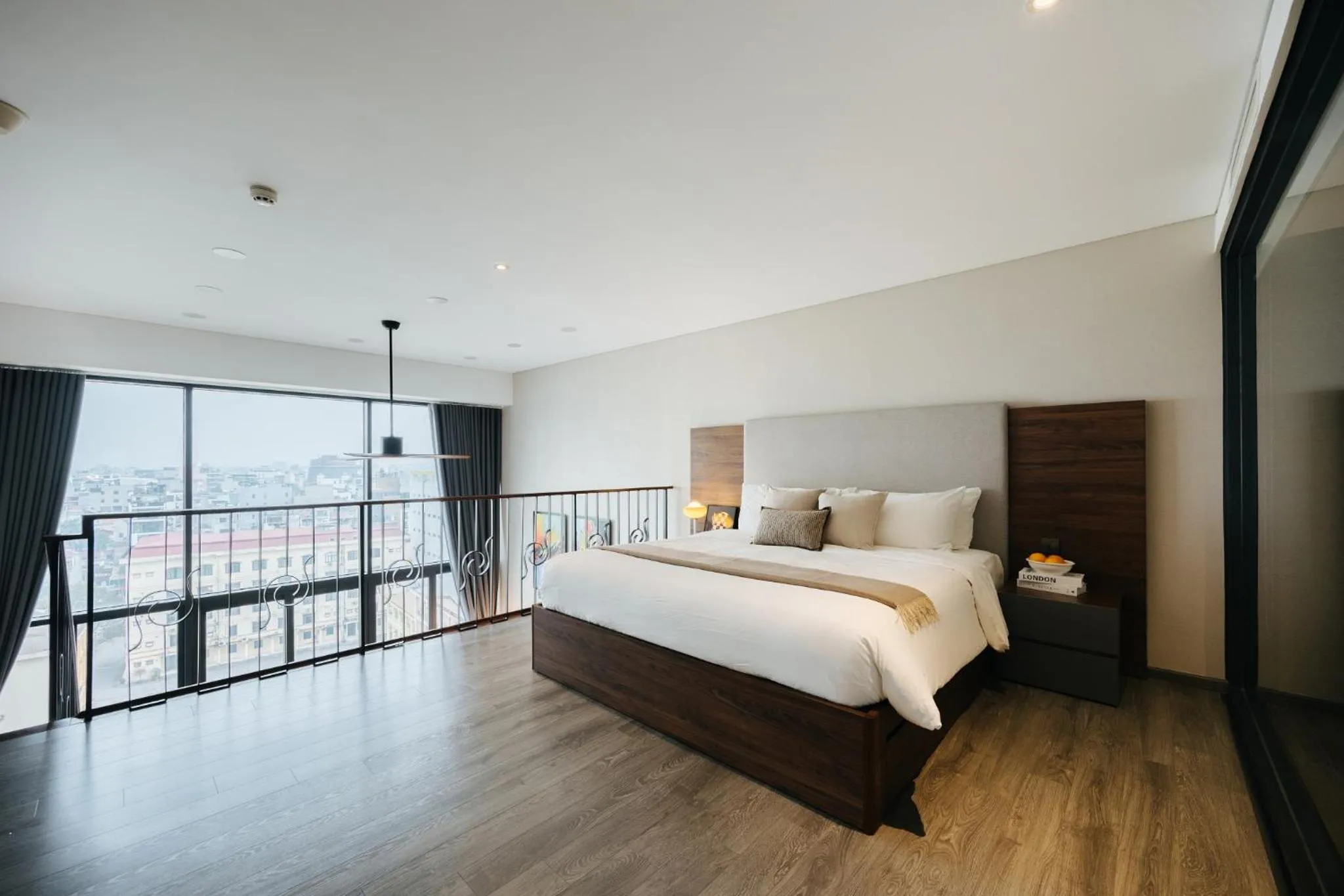 Bed in PentStudio Duplex Apartment