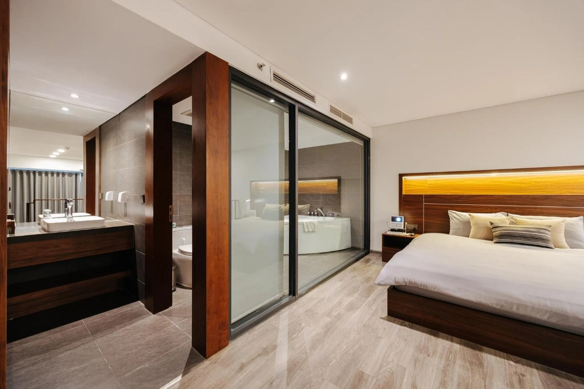 Bed in PentStudio Duplex Apartment