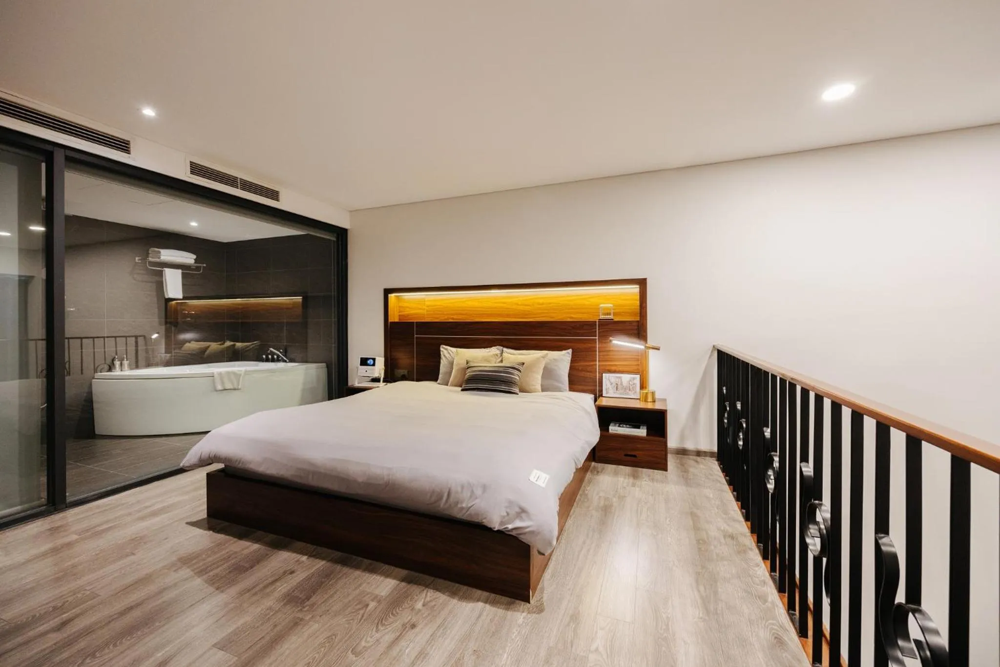 Bed in PentStudio Duplex Apartment