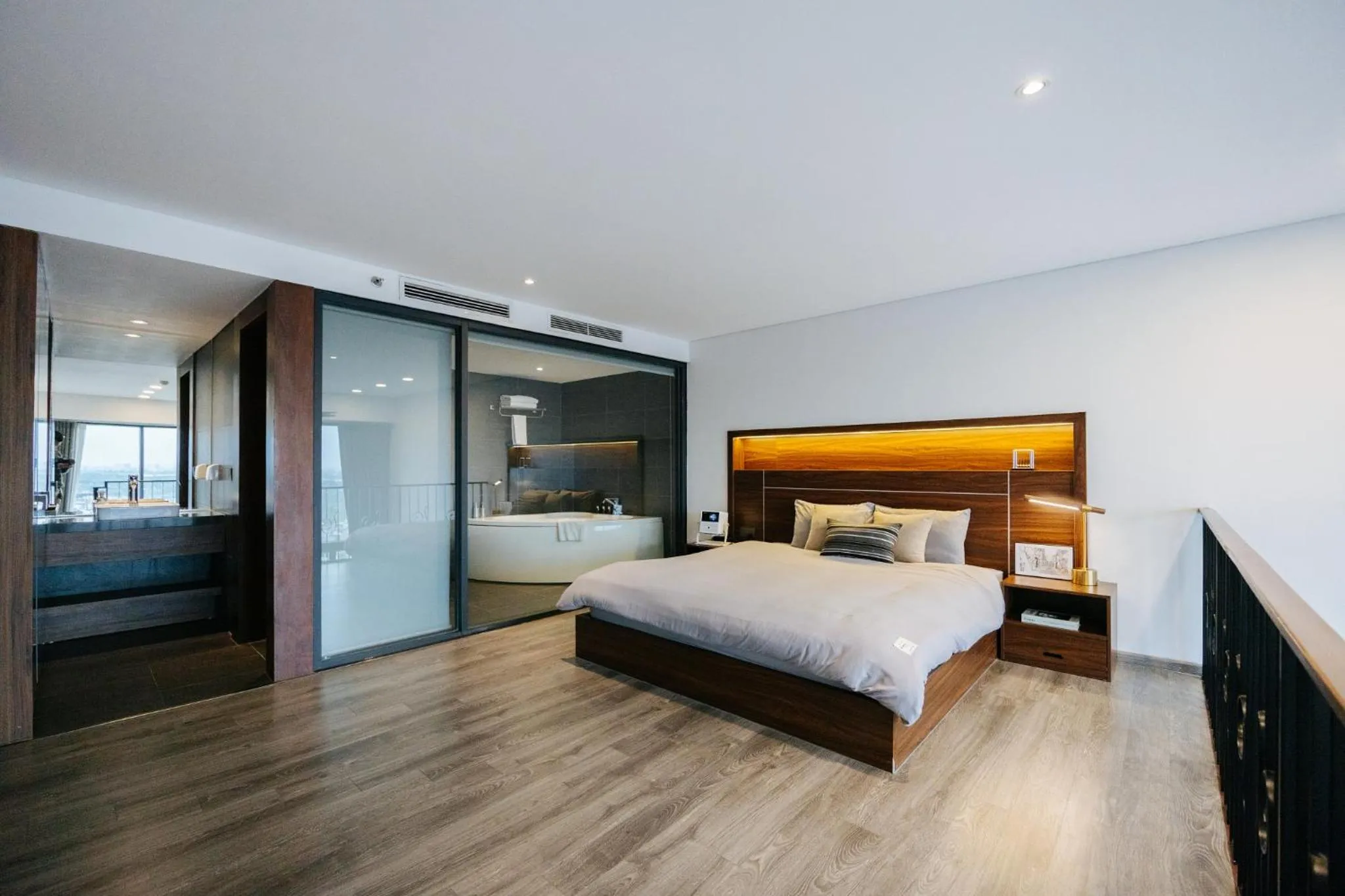 Bed in PentStudio Duplex Apartment