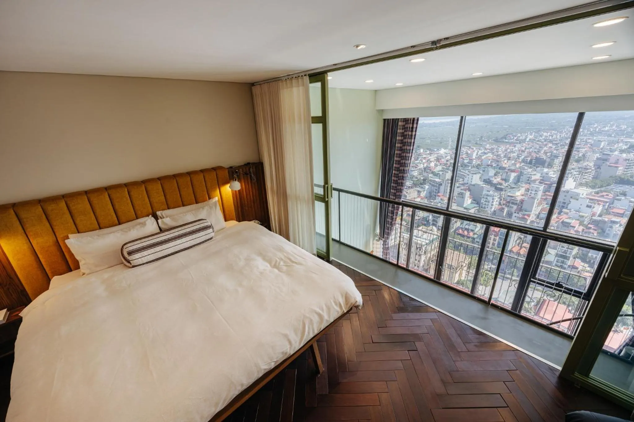 Bed in PentStudio Duplex Apartment