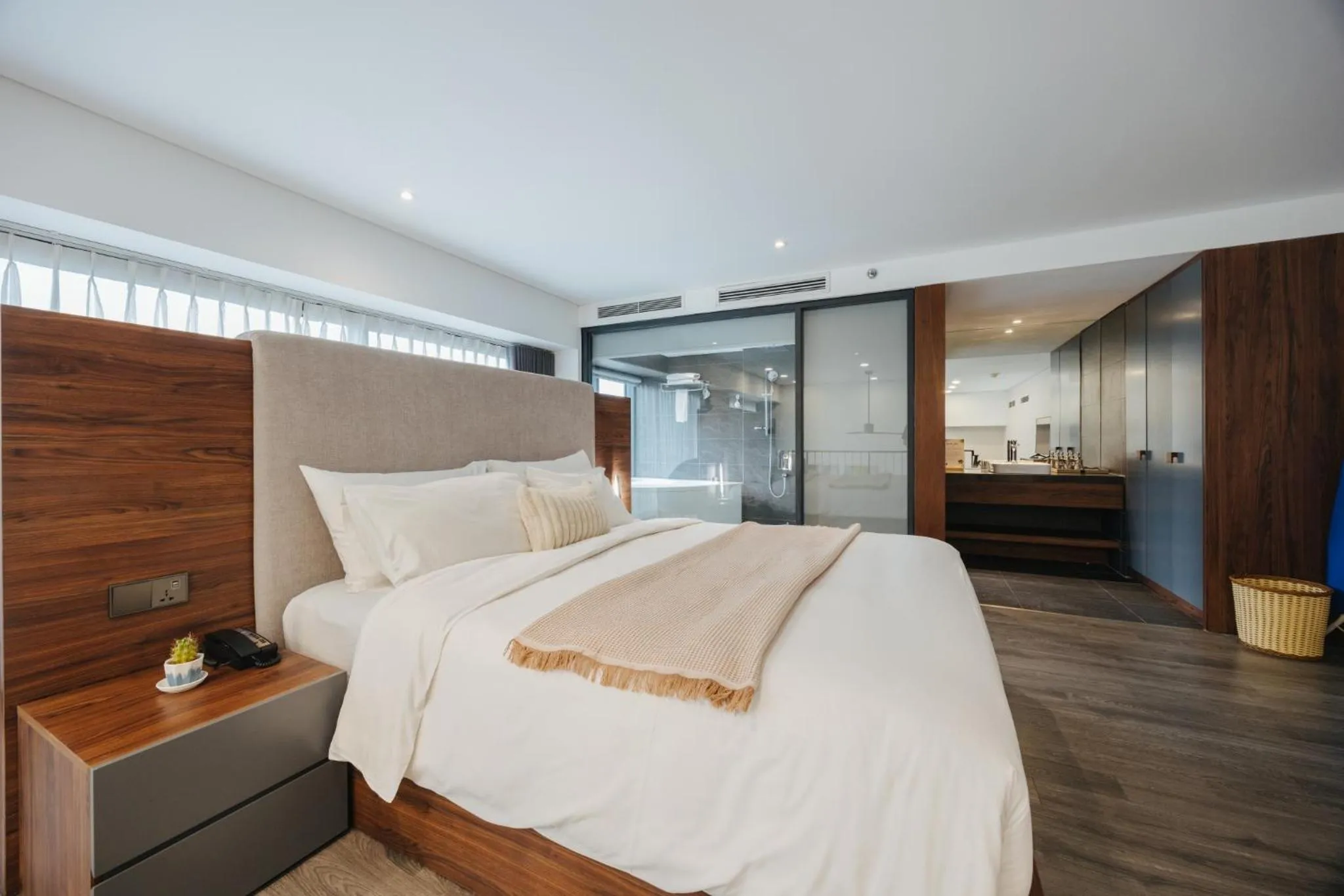 Bed in PentStudio Duplex Apartment