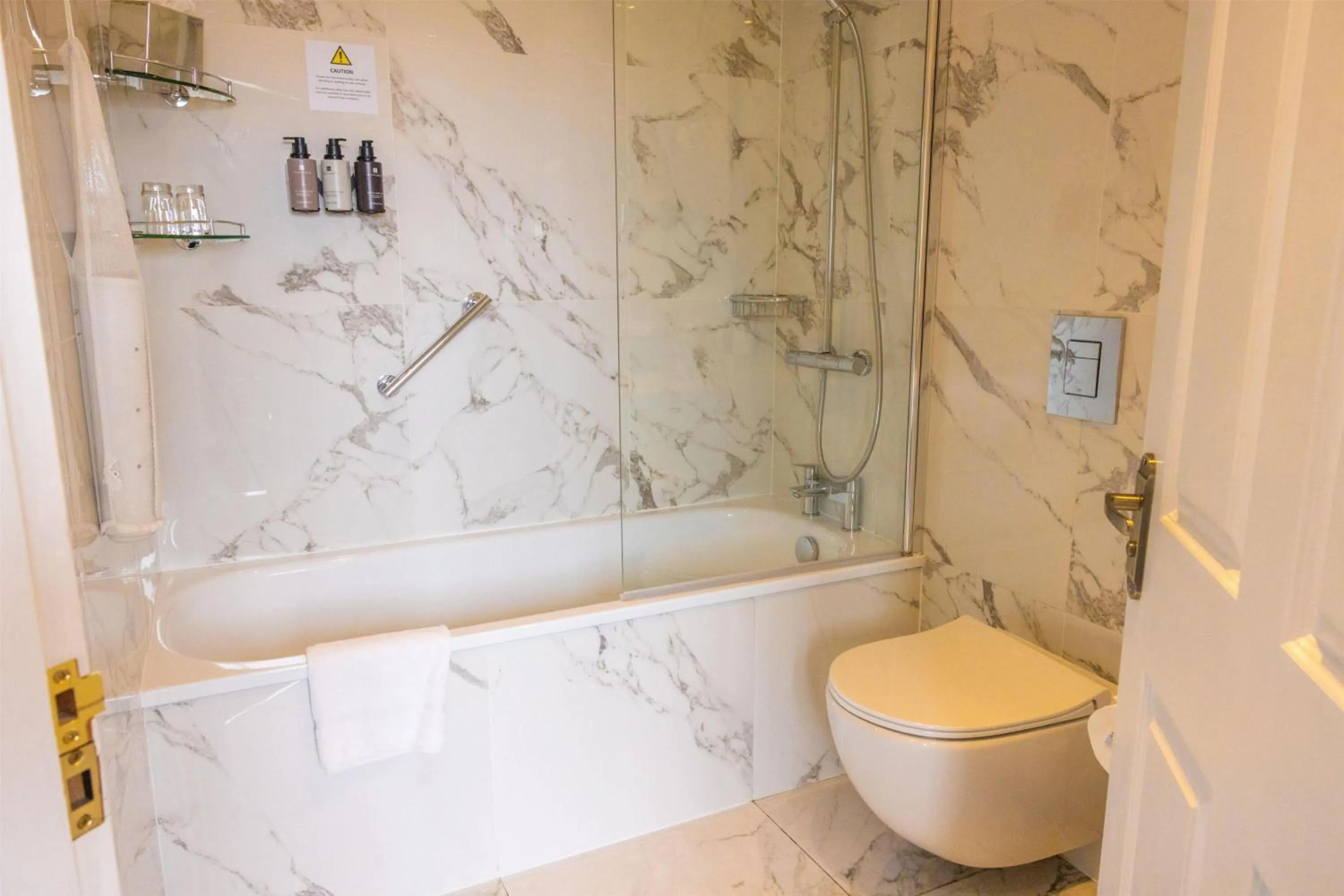 Bathroom in Dover Marina Hotel & Spa, Tapestry Collection by Hilton