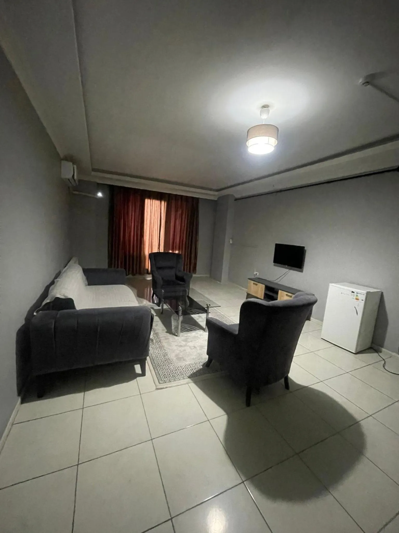 Seating area, Bed in Rosse Hotel