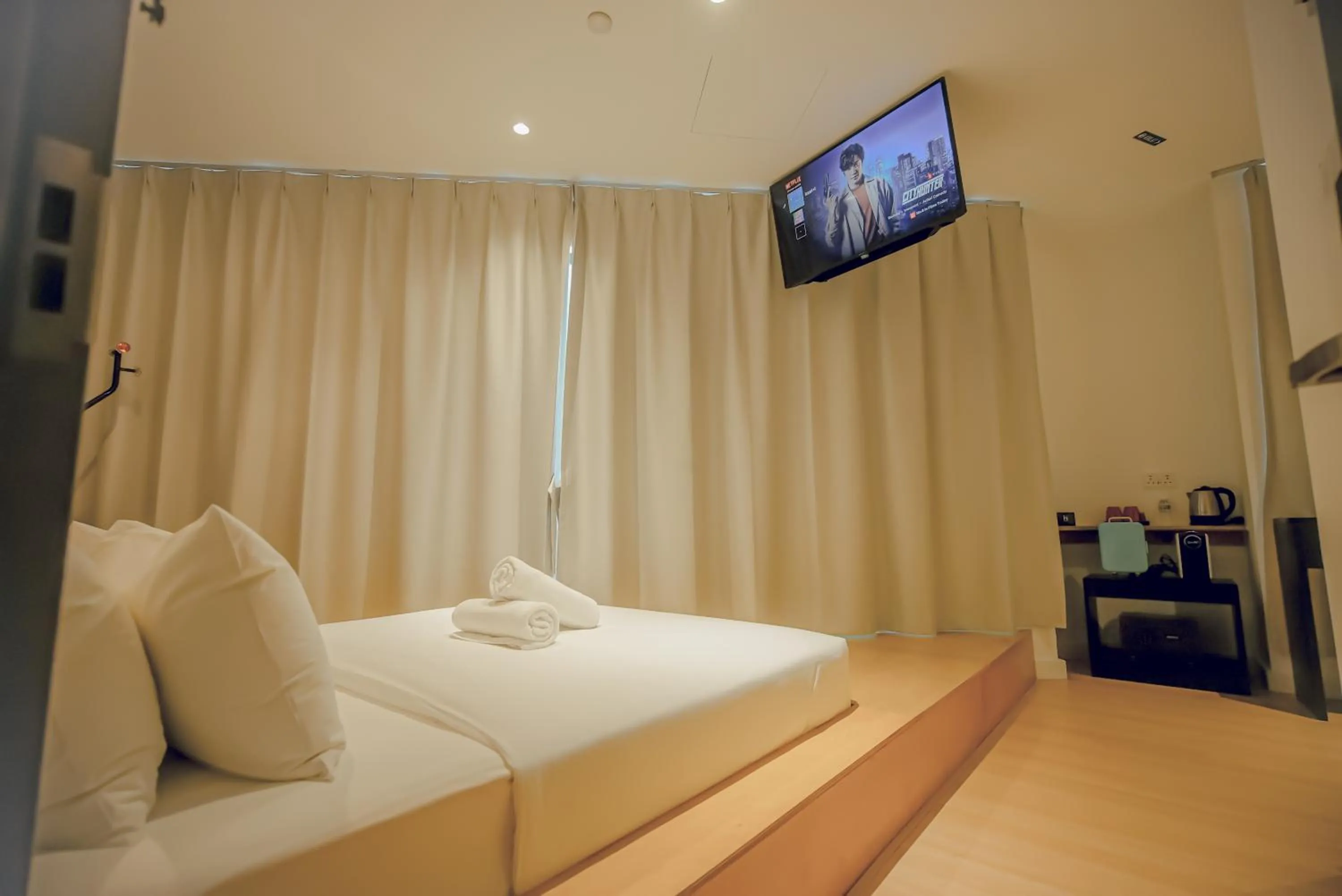 Bed in Double H Boutique Hotel