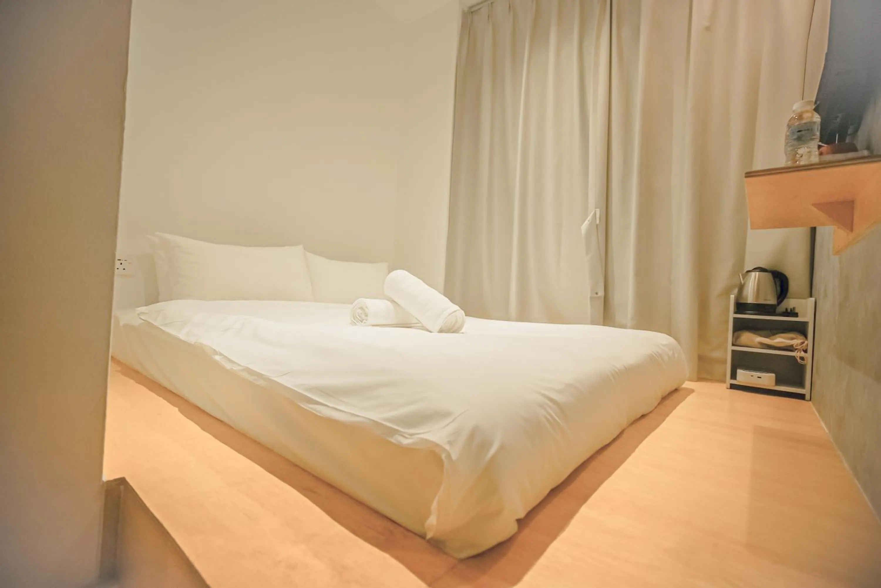 Bed in Double H Boutique Hotel