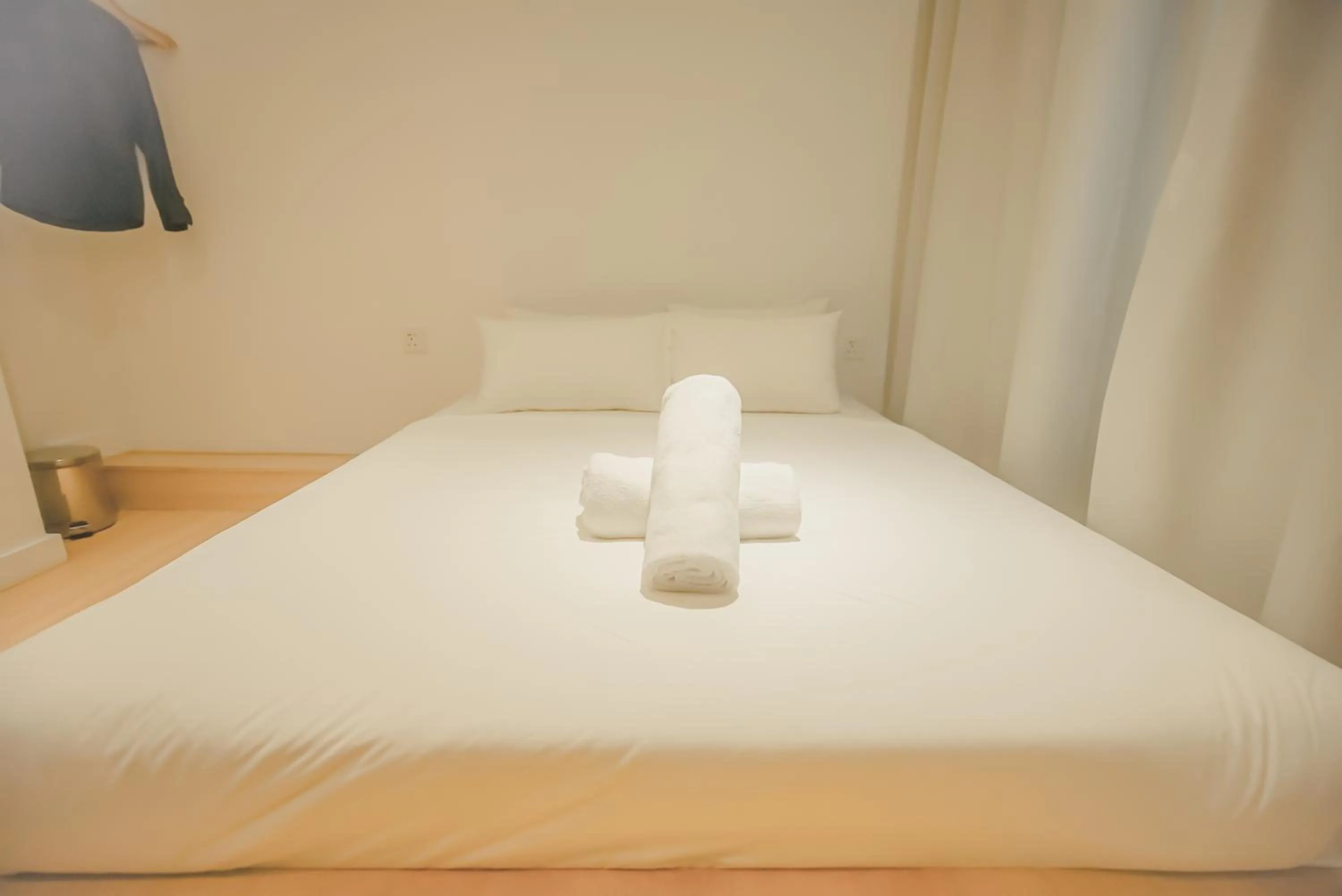 Bed in Double H Boutique Hotel