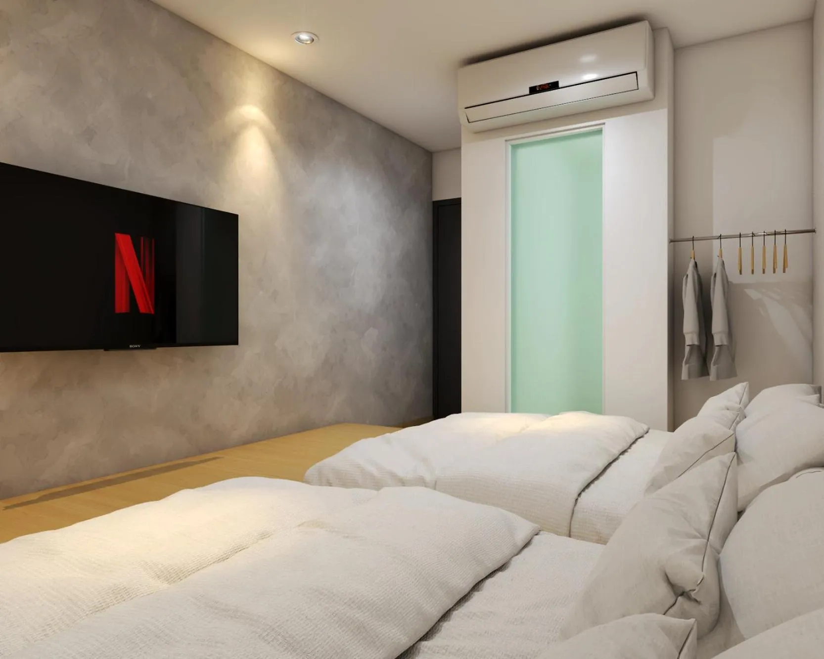 Bed in Double H Boutique Hotel