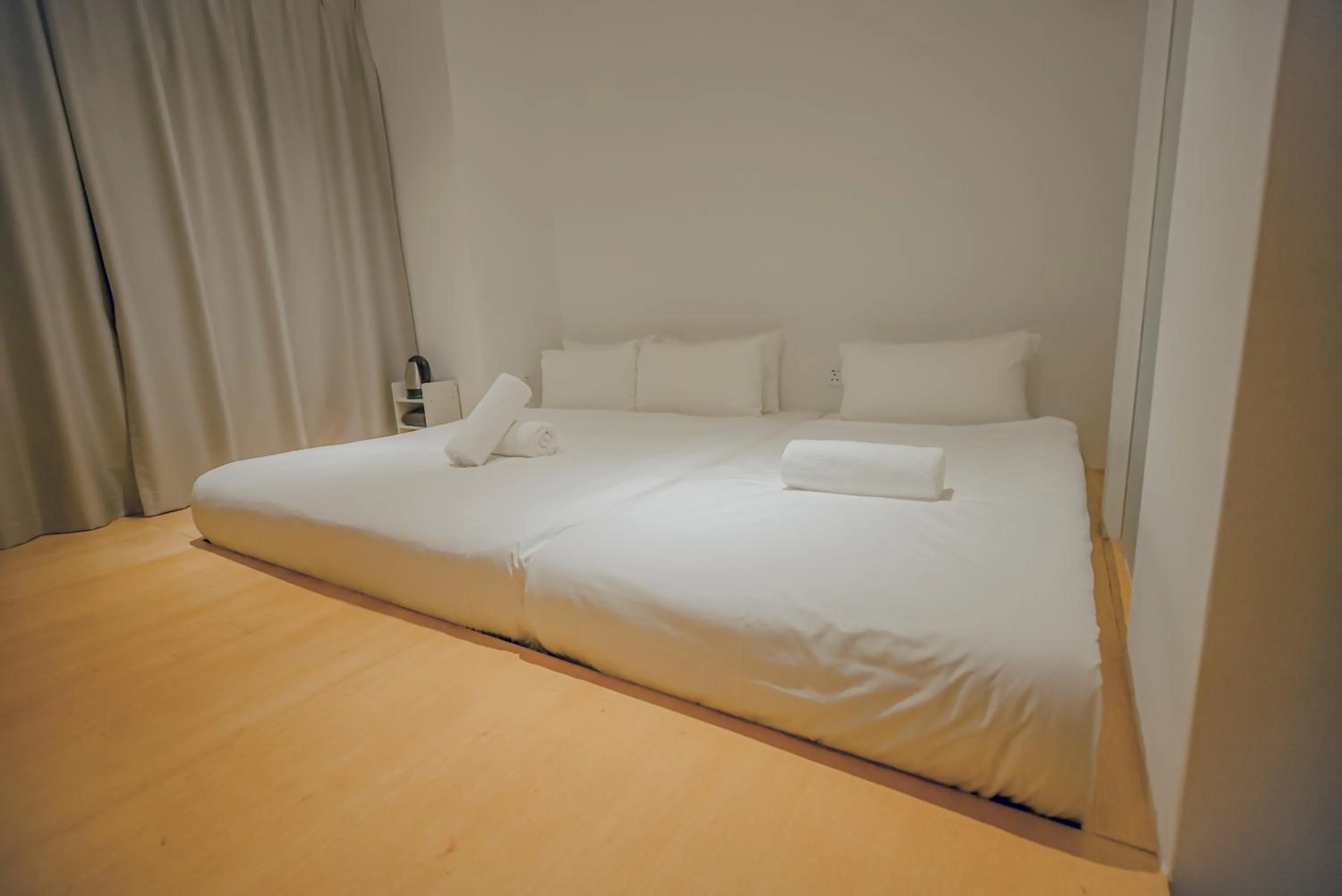 Bed in Double H Boutique Hotel