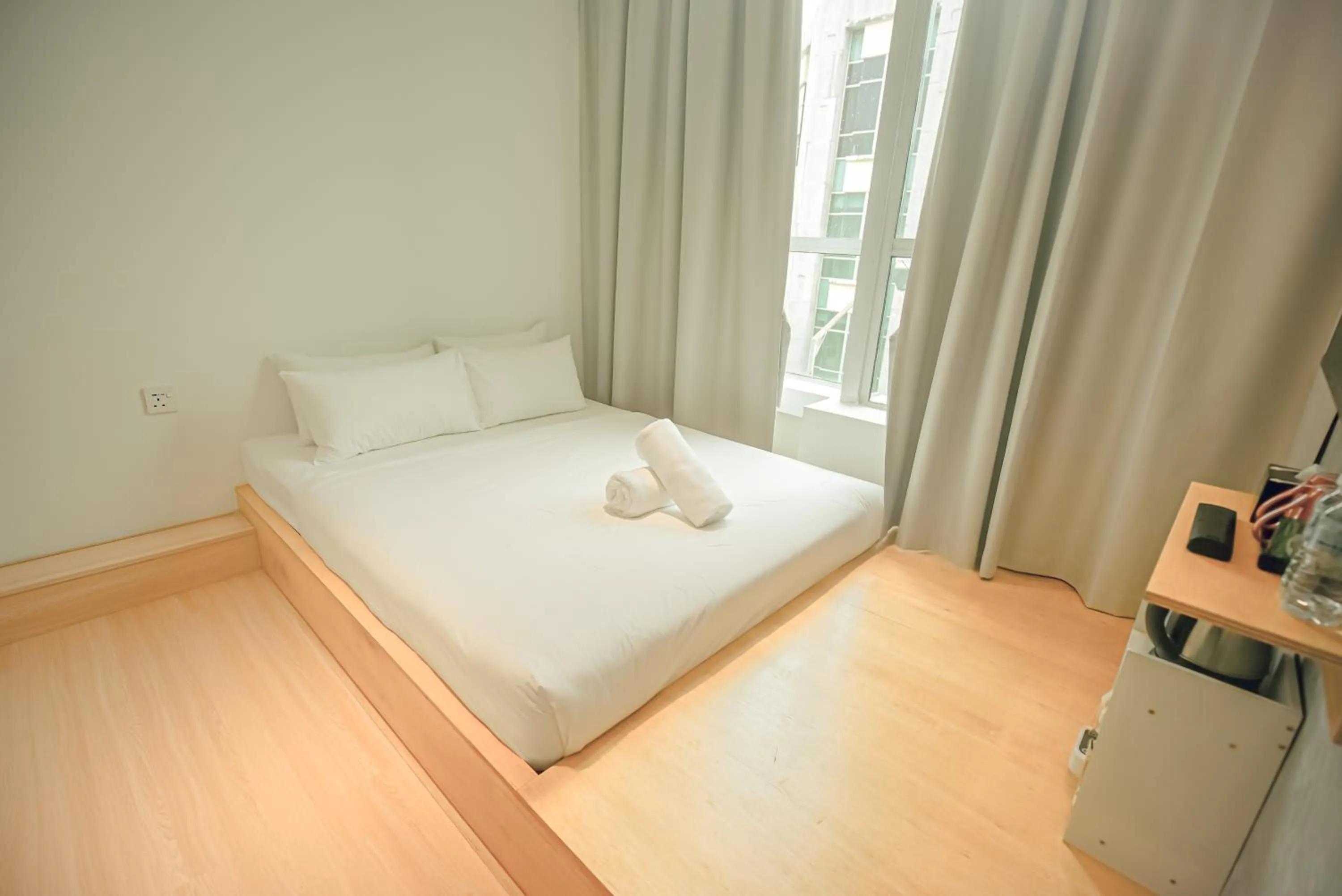 Bed in Double H Boutique Hotel