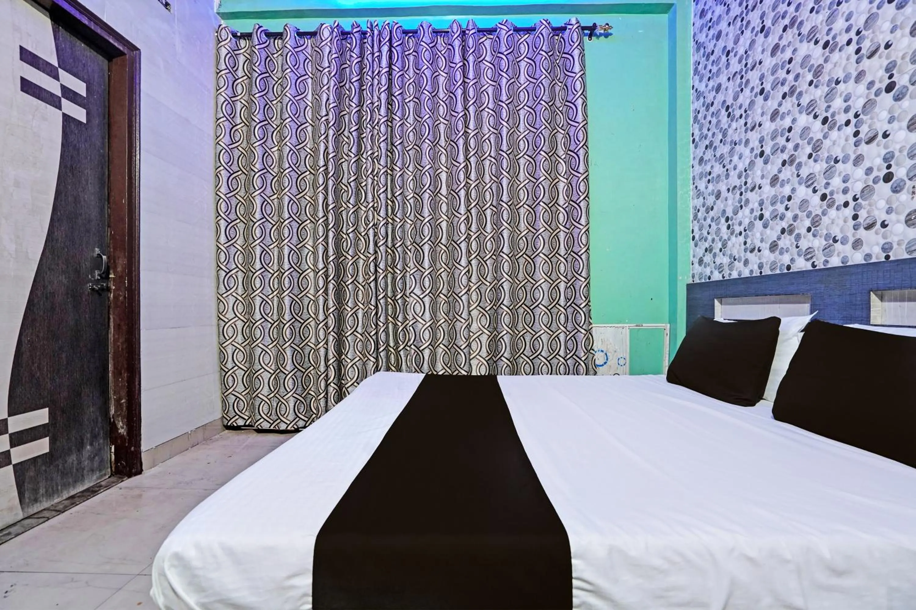 Bedroom in Hotel O Ginni