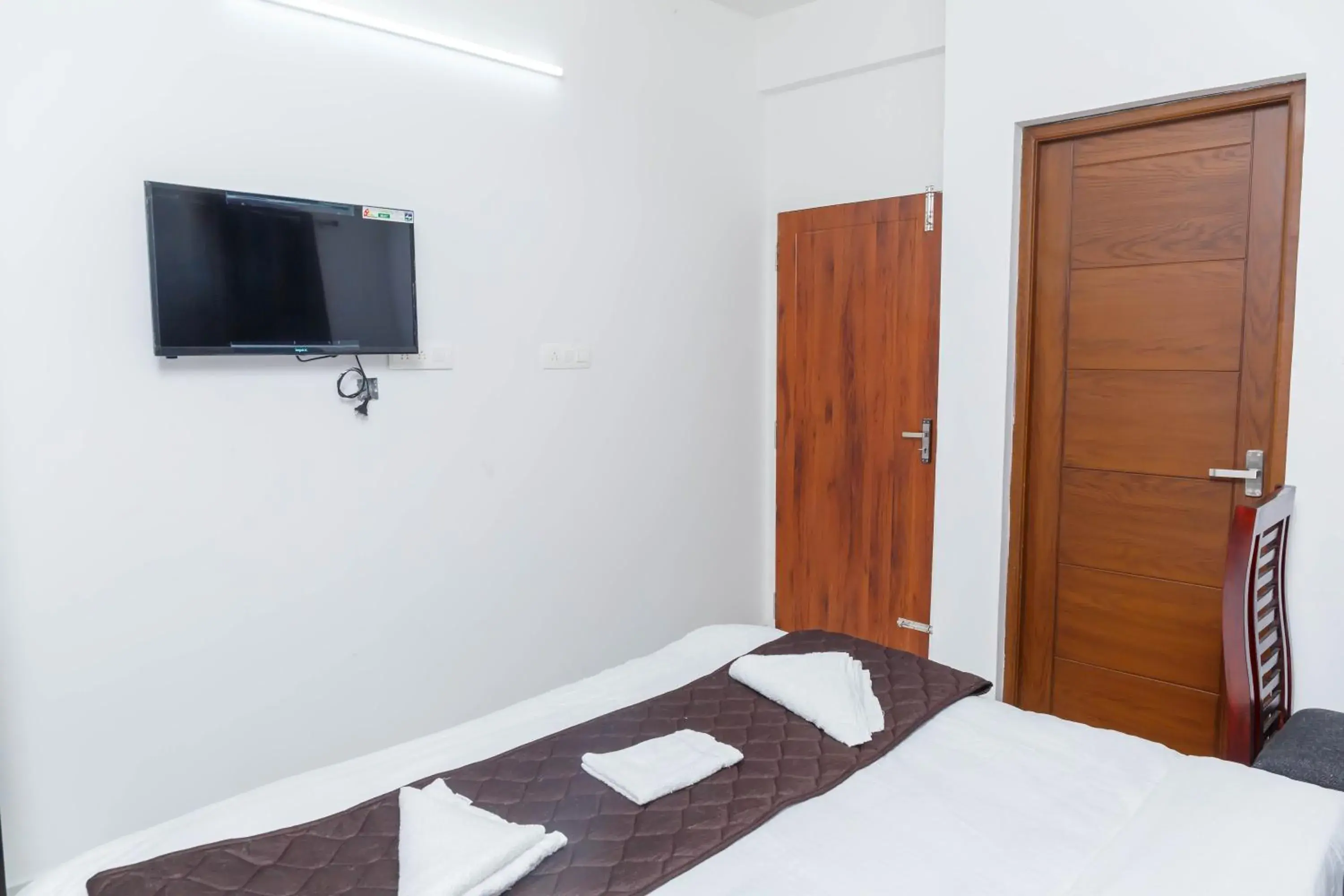 Bed in Guest West Inn Cochin Bed in Guest West Inn Cochin