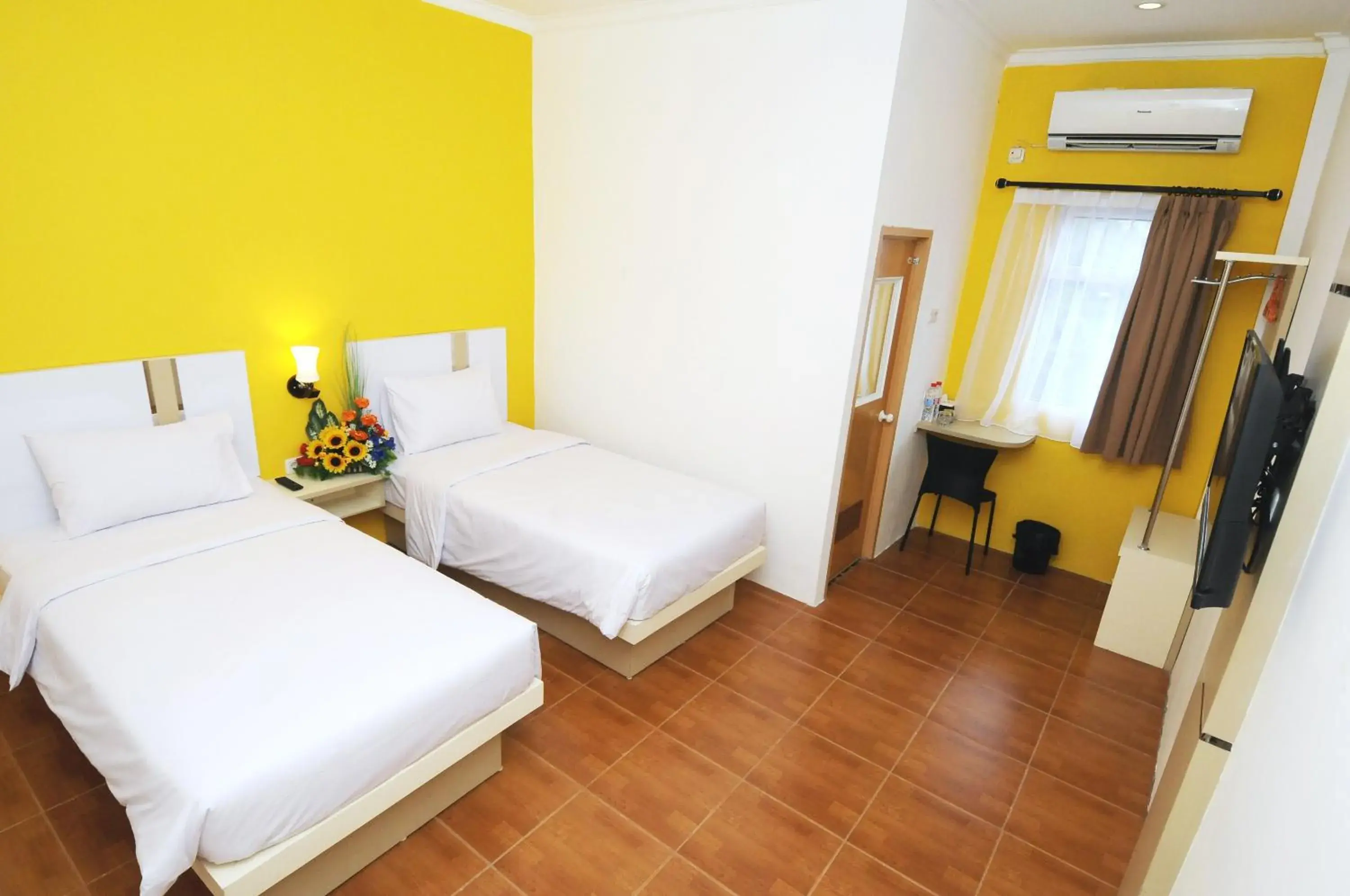 Bed in Ruma Ruma Hotel Kenten - Palembang Bed in Ruma Ruma Hotel Kenten - Palembang