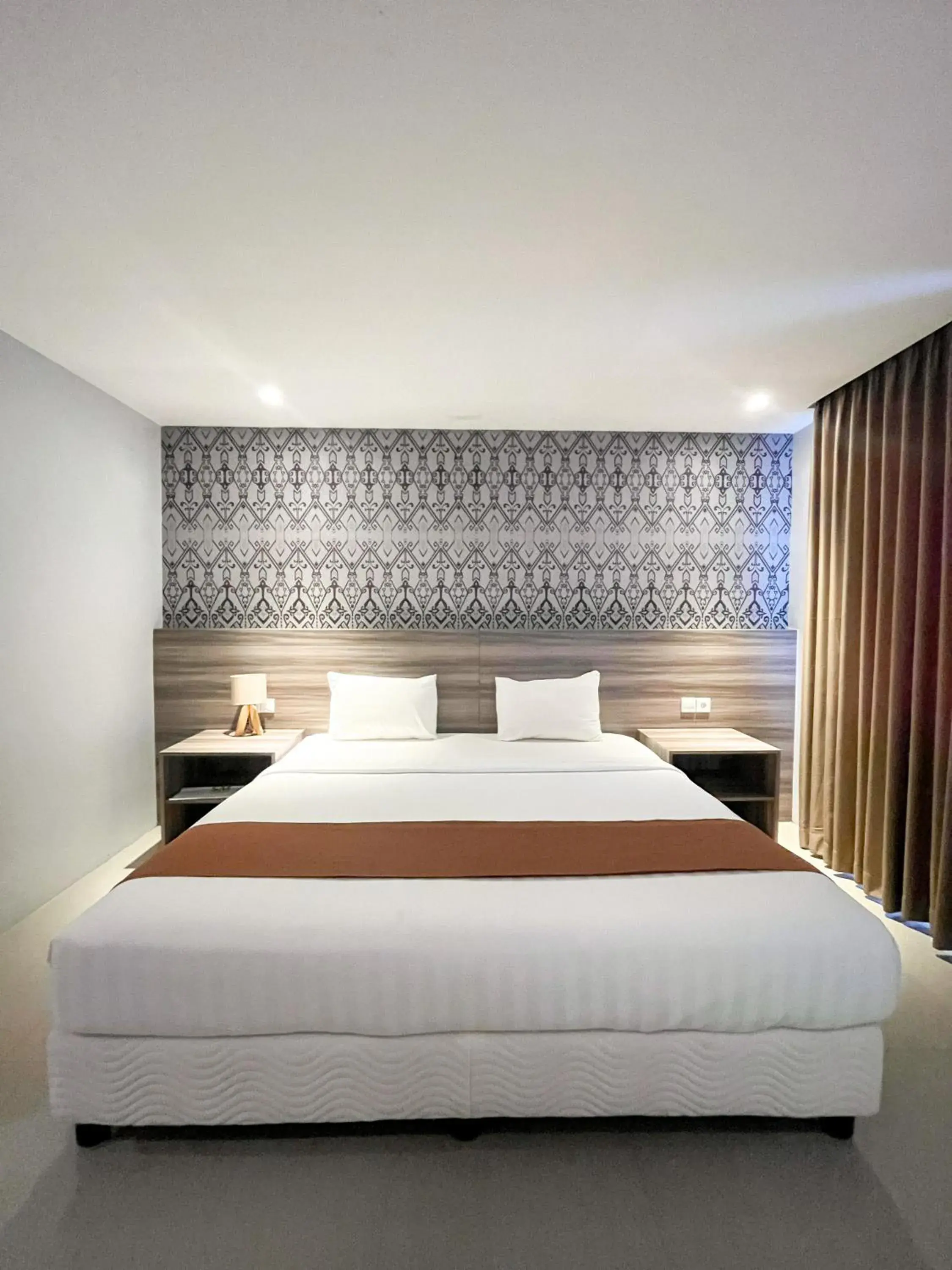 Bed in SM Tower Hotel and Convention Berau Bed in SM Tower Hotel and Convention Berau