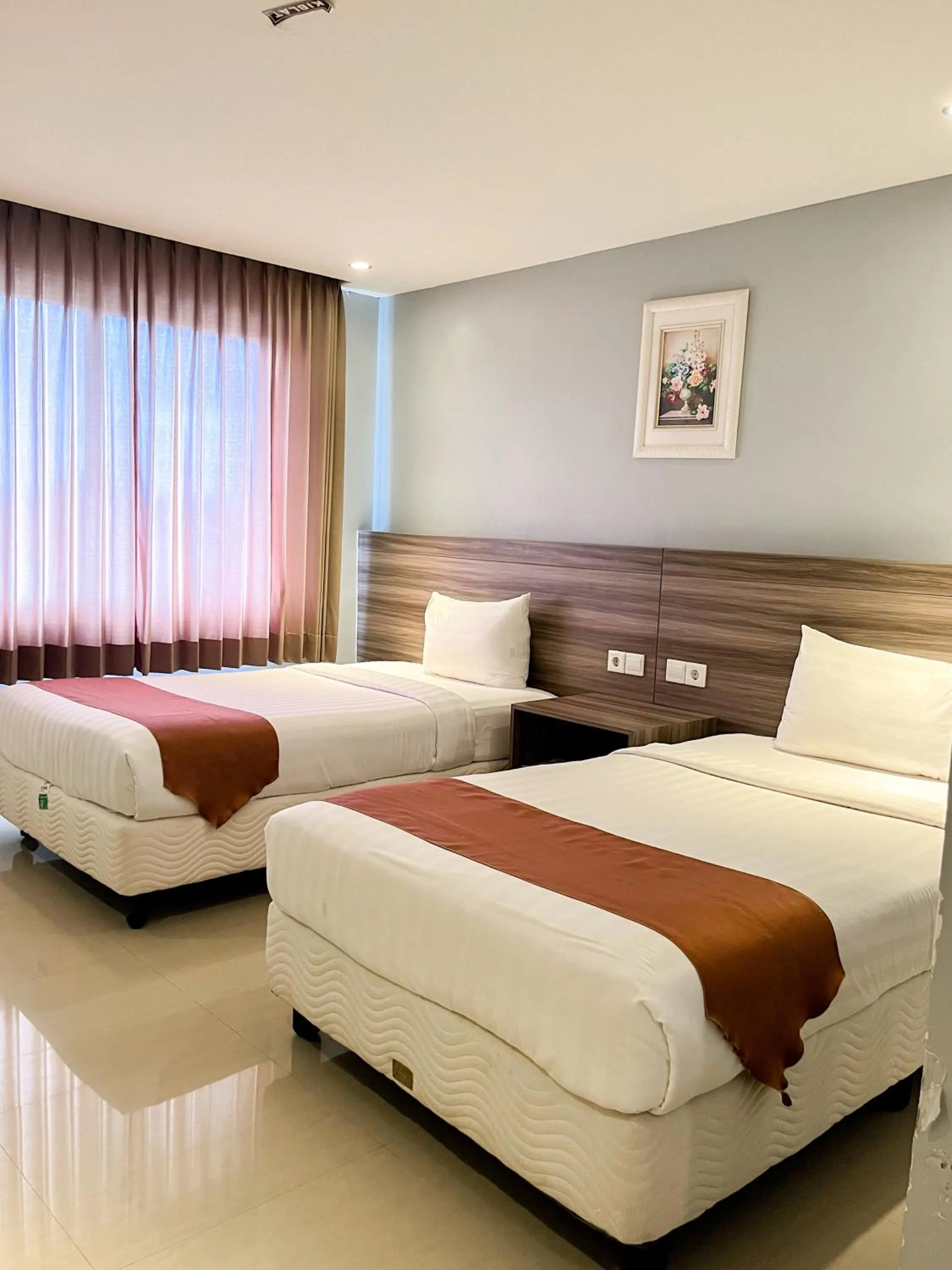 Bed in SM Tower Hotel and Convention Berau