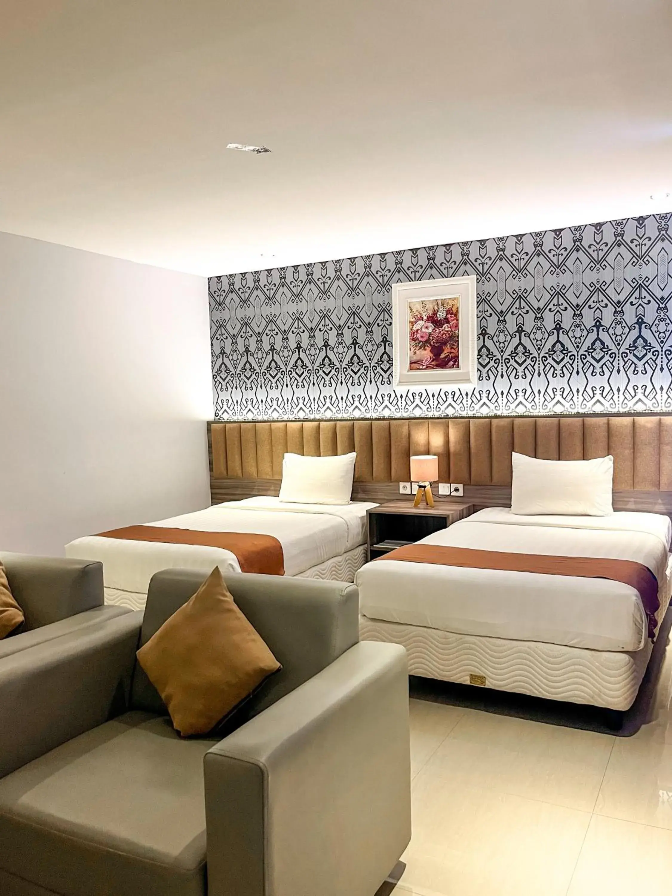 Bed in SM Tower Hotel and Convention Berau Bed in SM Tower Hotel and Convention Berau