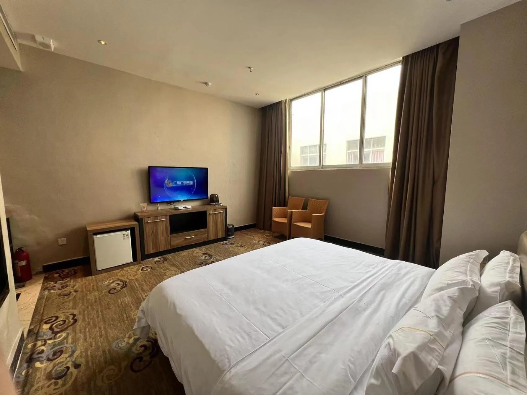 Bed in Caribbean Hotel Zhongshan