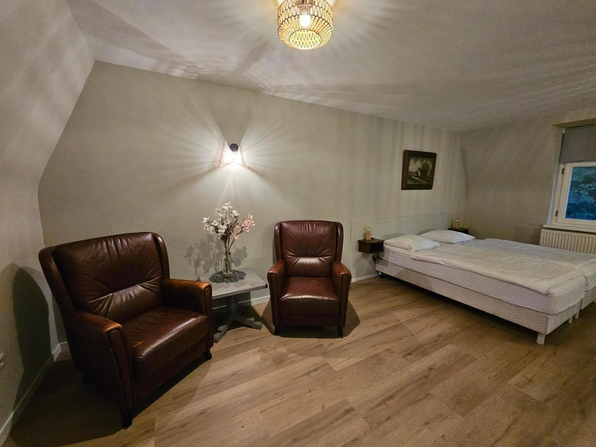 Seating area, Bed in De Arcense Herberg