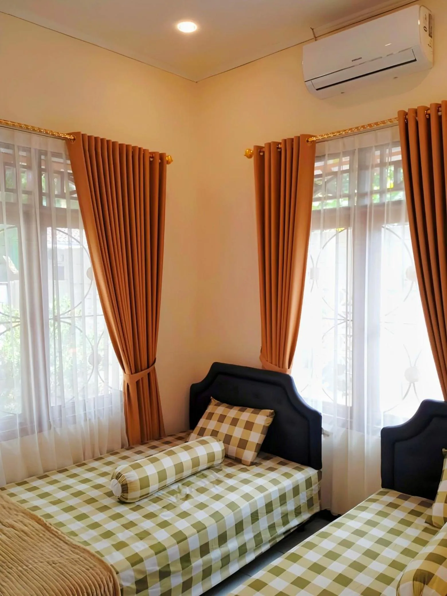 Bed in Penginapan Prambanan TRISAN