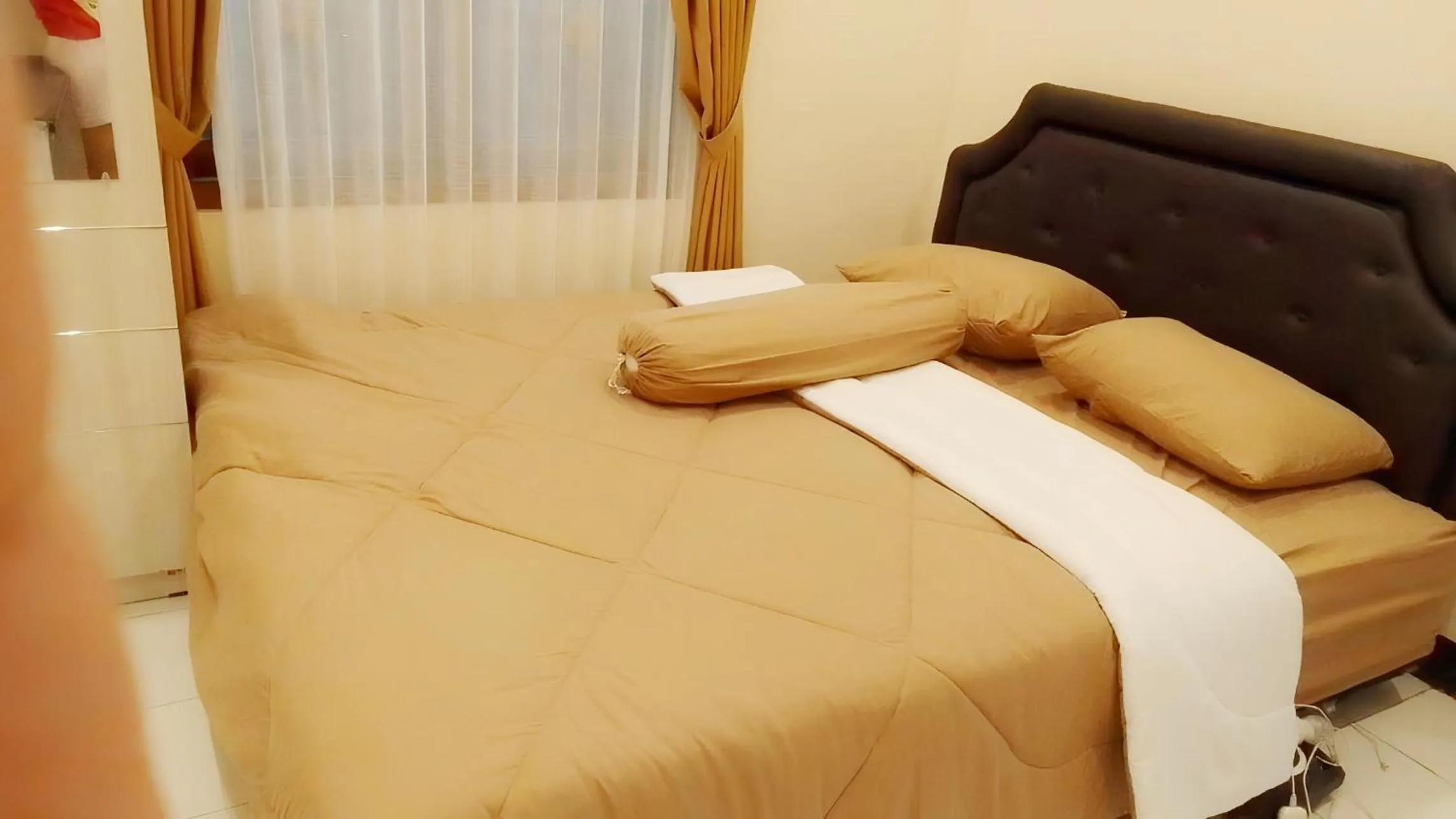 Bed in Penginapan Prambanan TRISAN