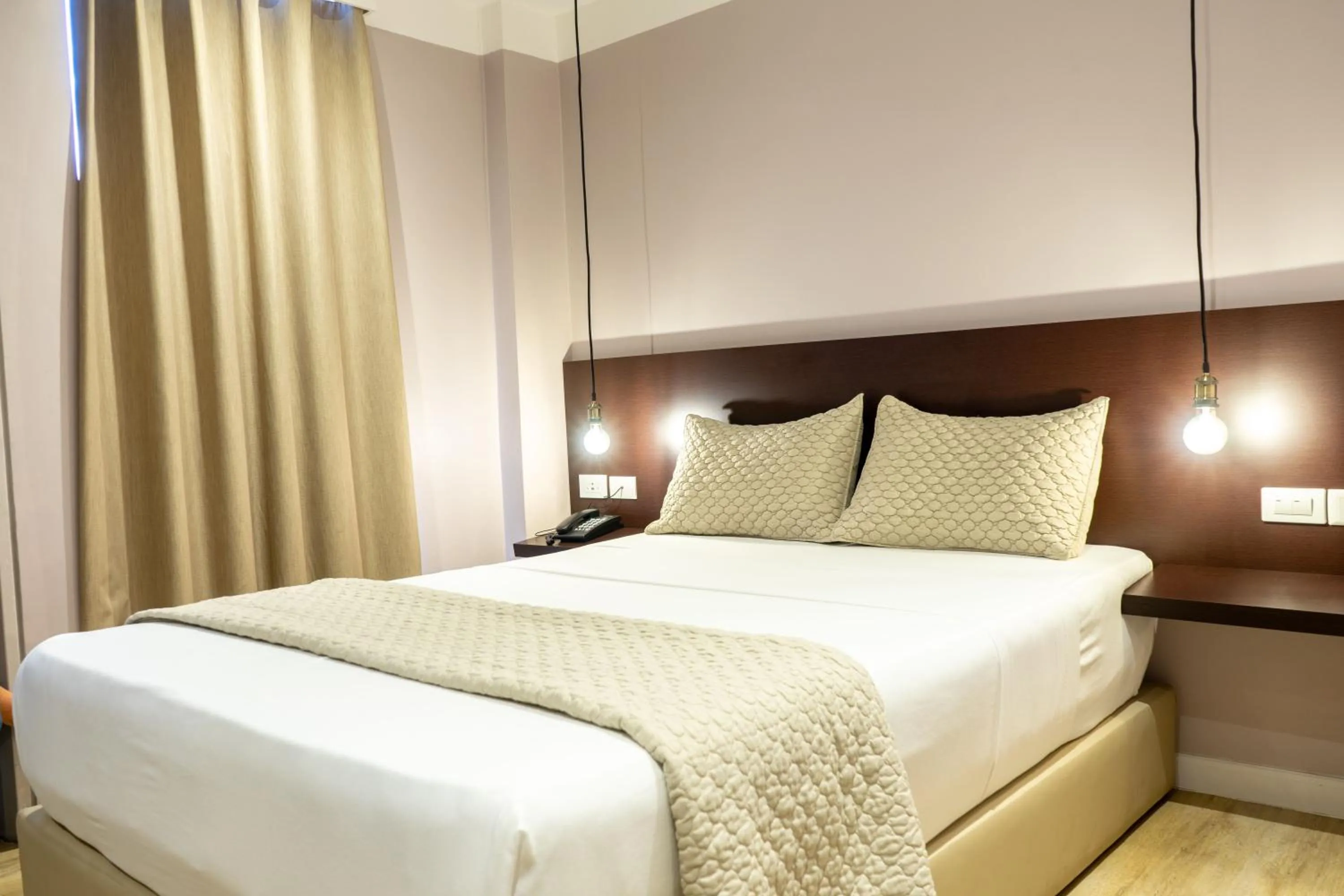 Bed in Hotel Grand Galaxie