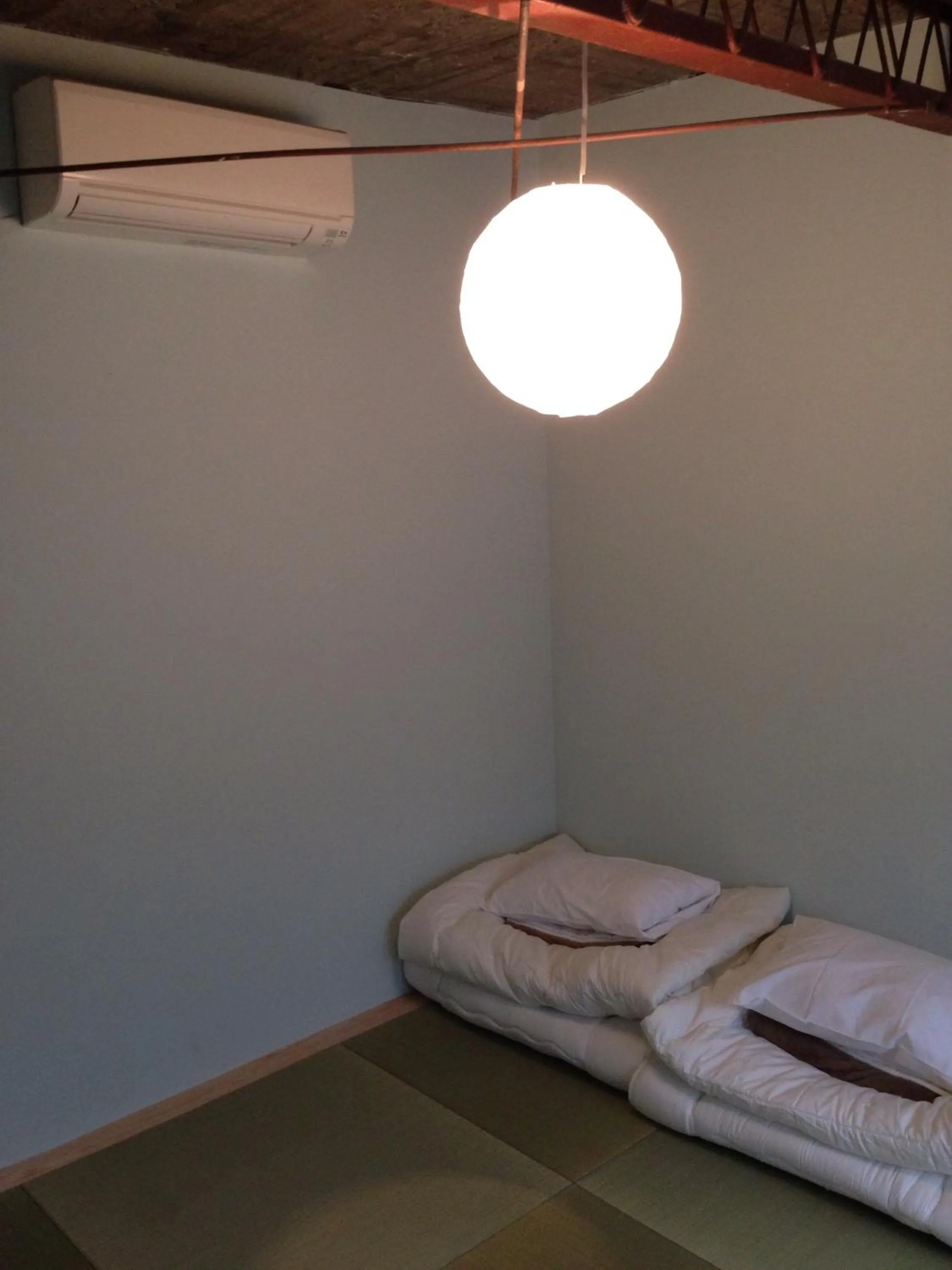 Decorative detail, Bed in Kamp Houkan-cho Backpacker's Inn & Lounge